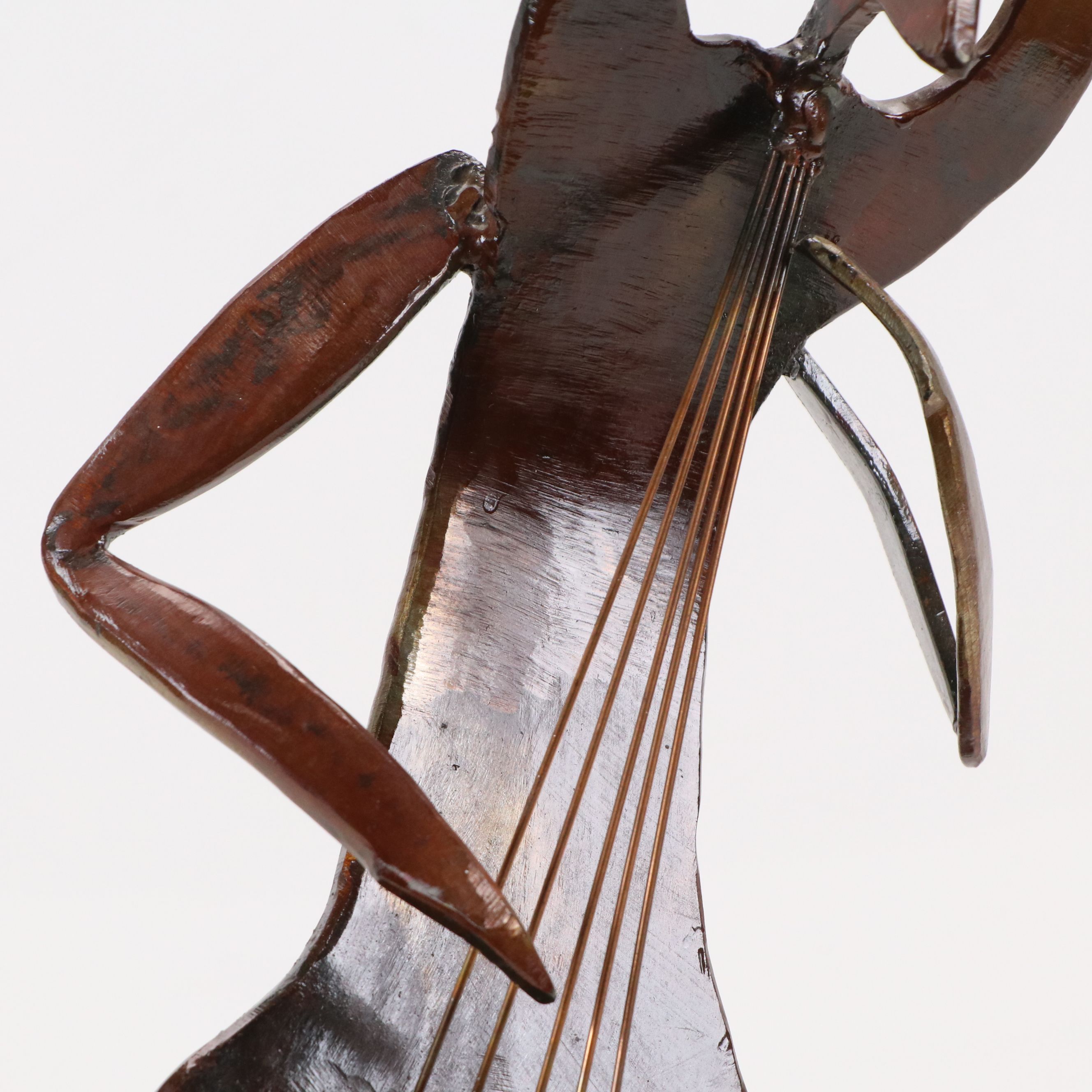 William Wessel Iron Sculpture "Cello Man"