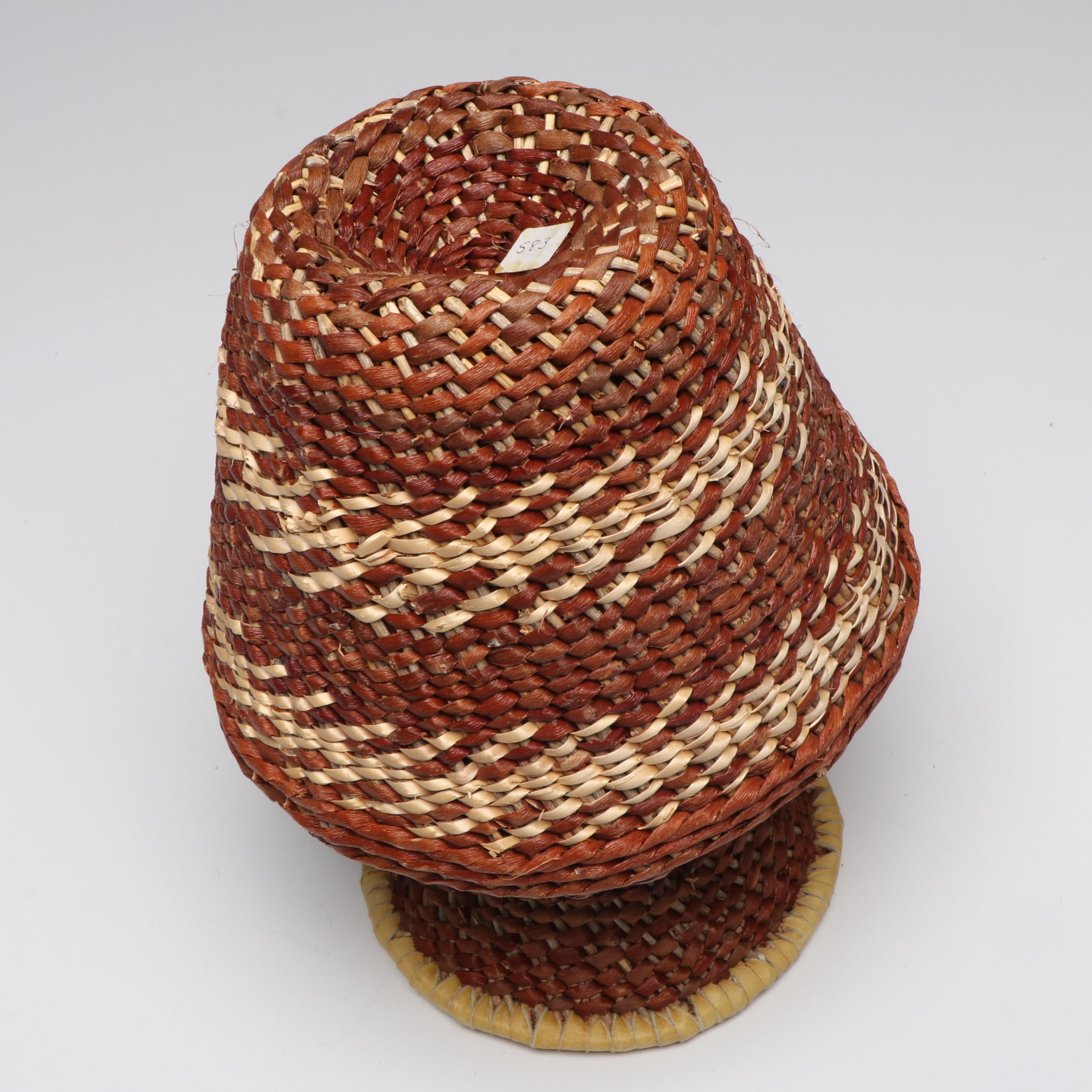 Lolita Manuel with Other Indé (Apache) Willow Fiber Basketry Vessels