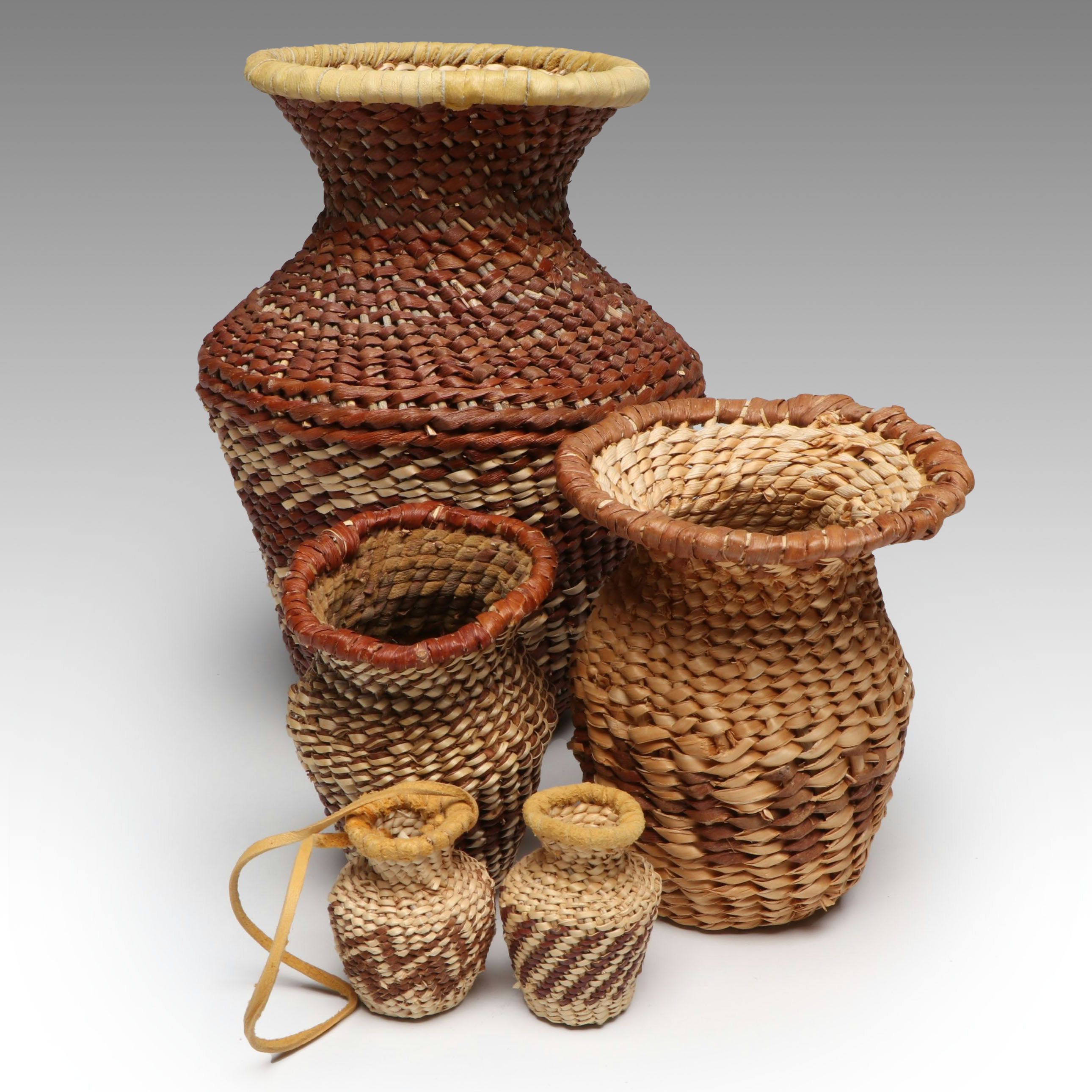 Lolita Manuel with Other Indé (Apache) Willow Fiber Basketry Vessels