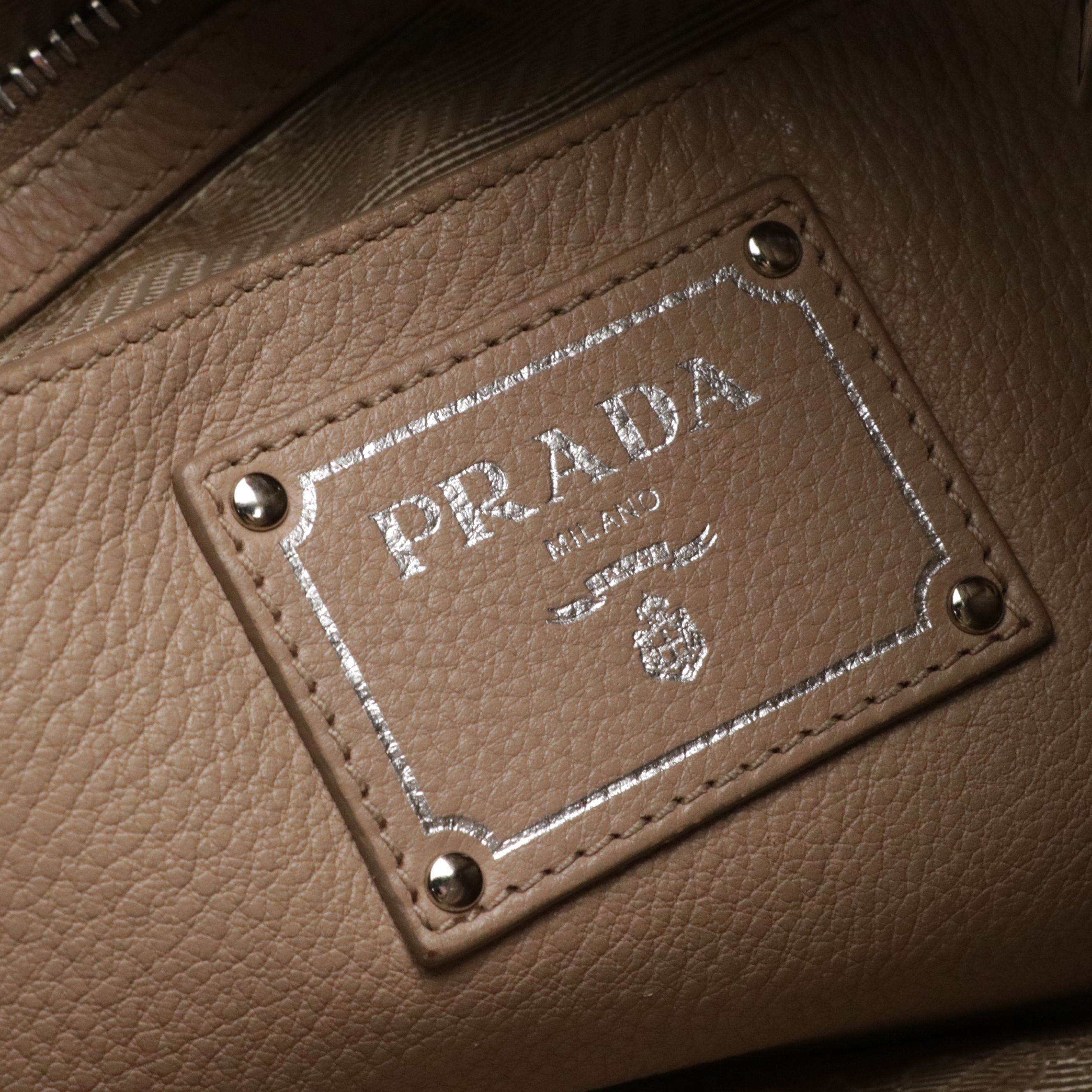 Prada Front Zip Top Handle Two-Way Bag in Vitello Daino Leather