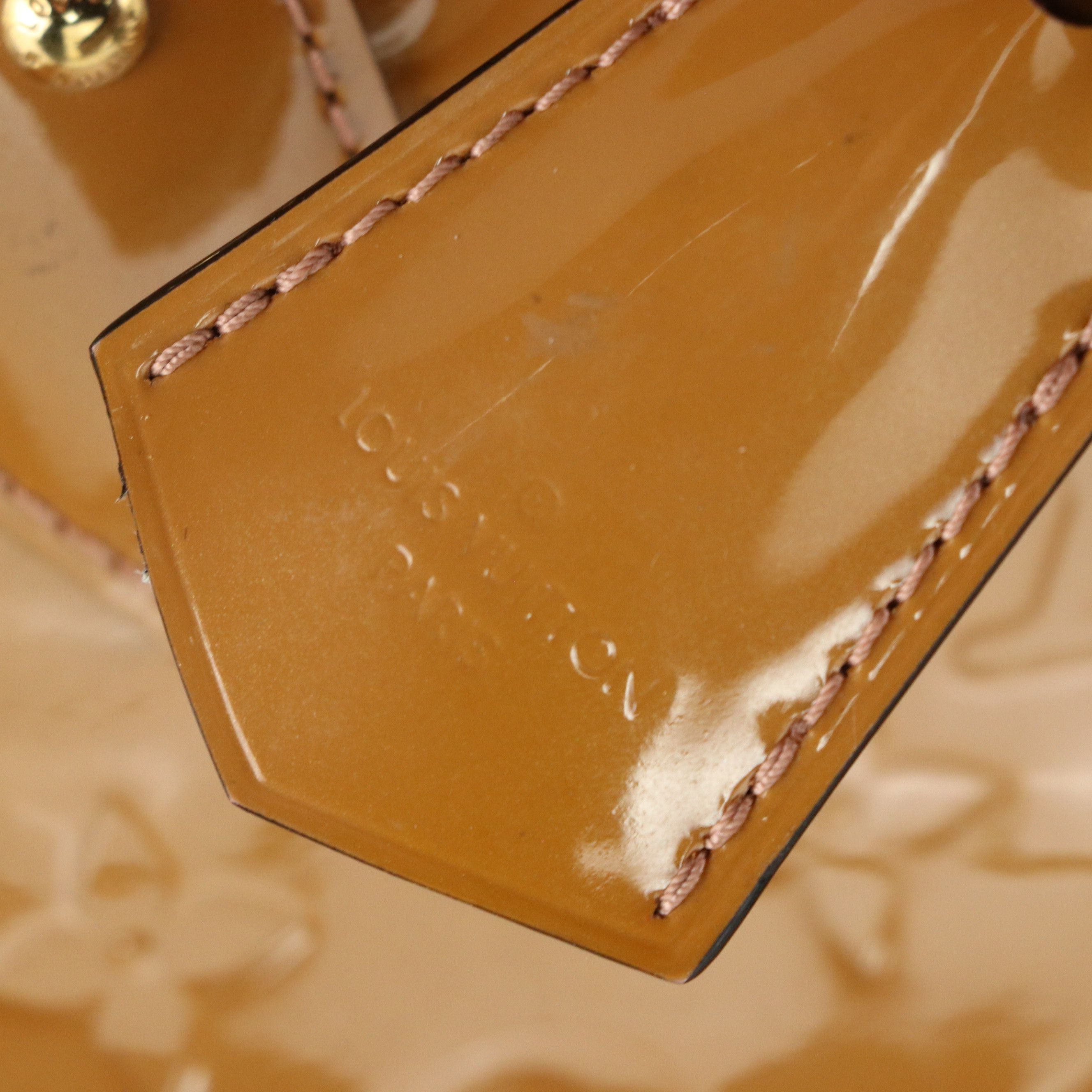 Louis Vuitton Alma PM Handbag in Monogram Vernis