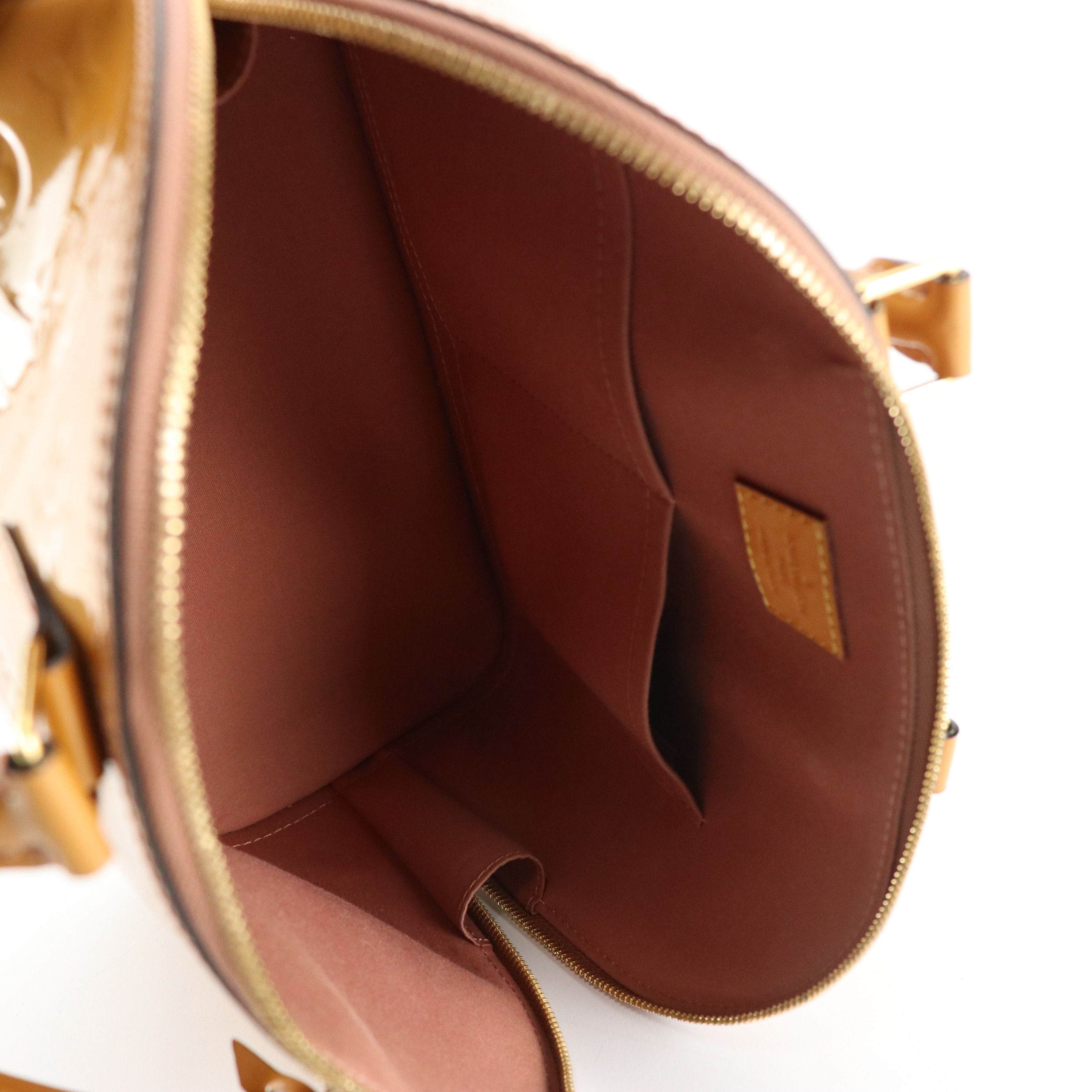 Louis Vuitton Alma PM Handbag in Monogram Vernis