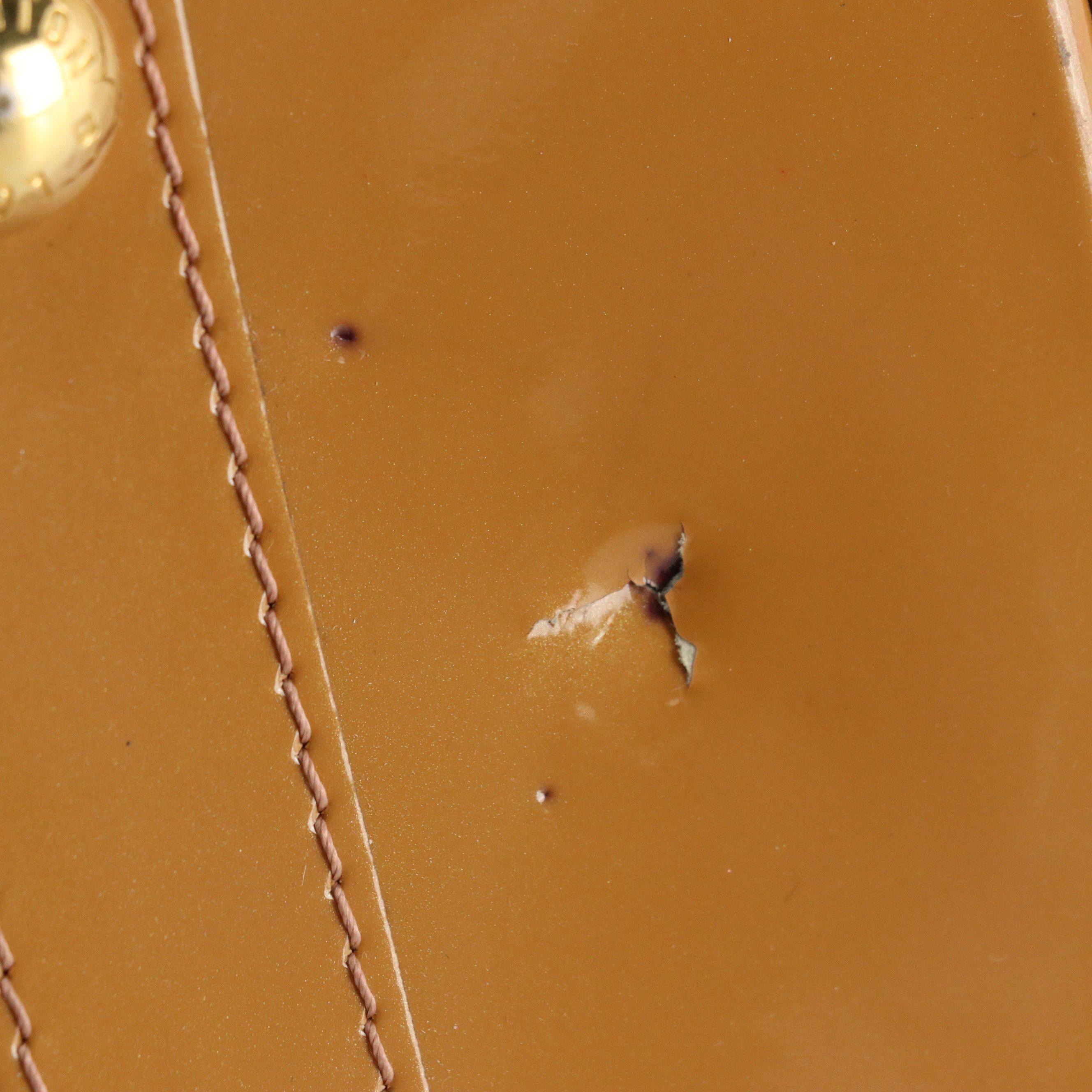 Louis Vuitton Alma PM Handbag in Monogram Vernis