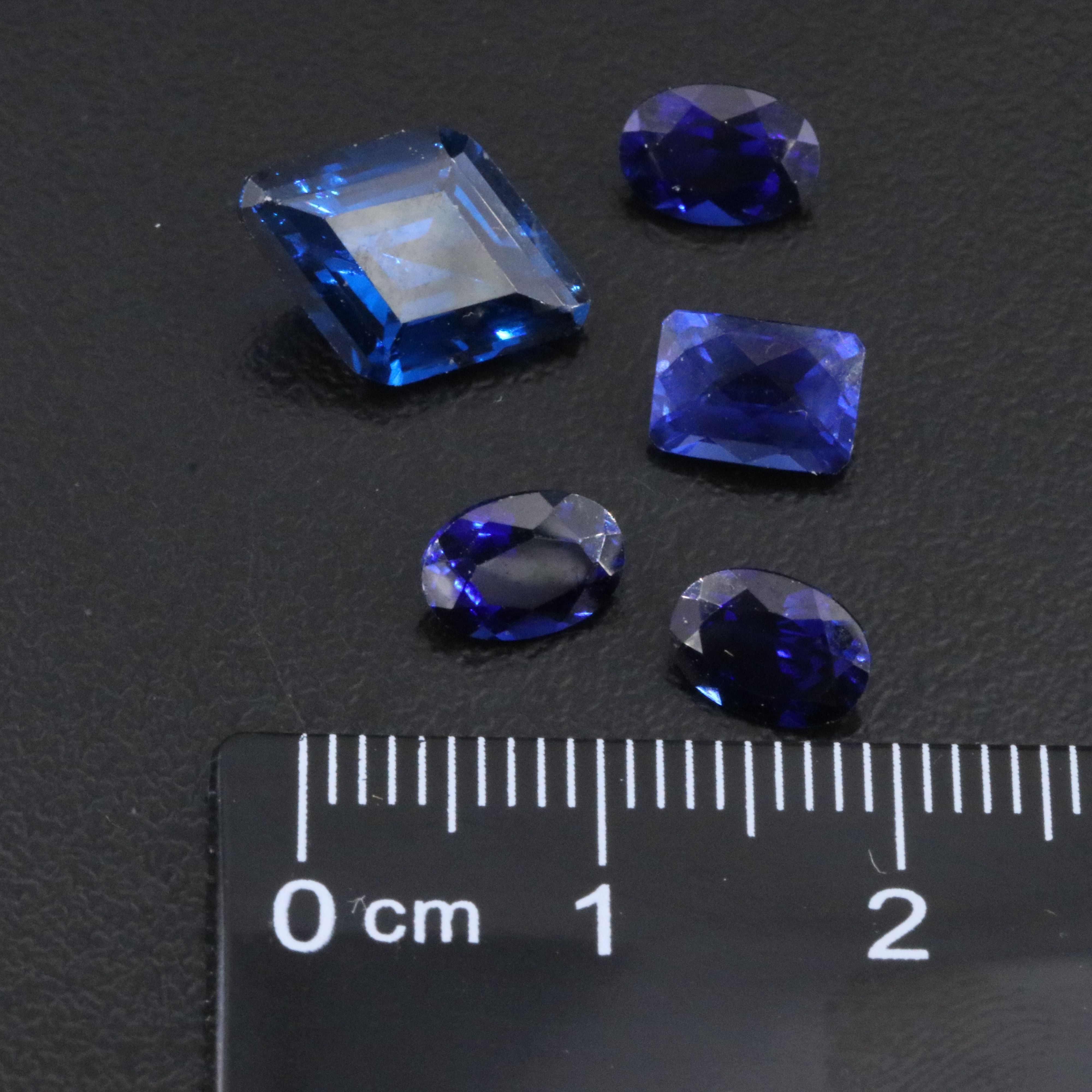 Loose 8.04 CTW Gemstone Lot Including Lab Grown Spinel and Lab Grown Sapphire