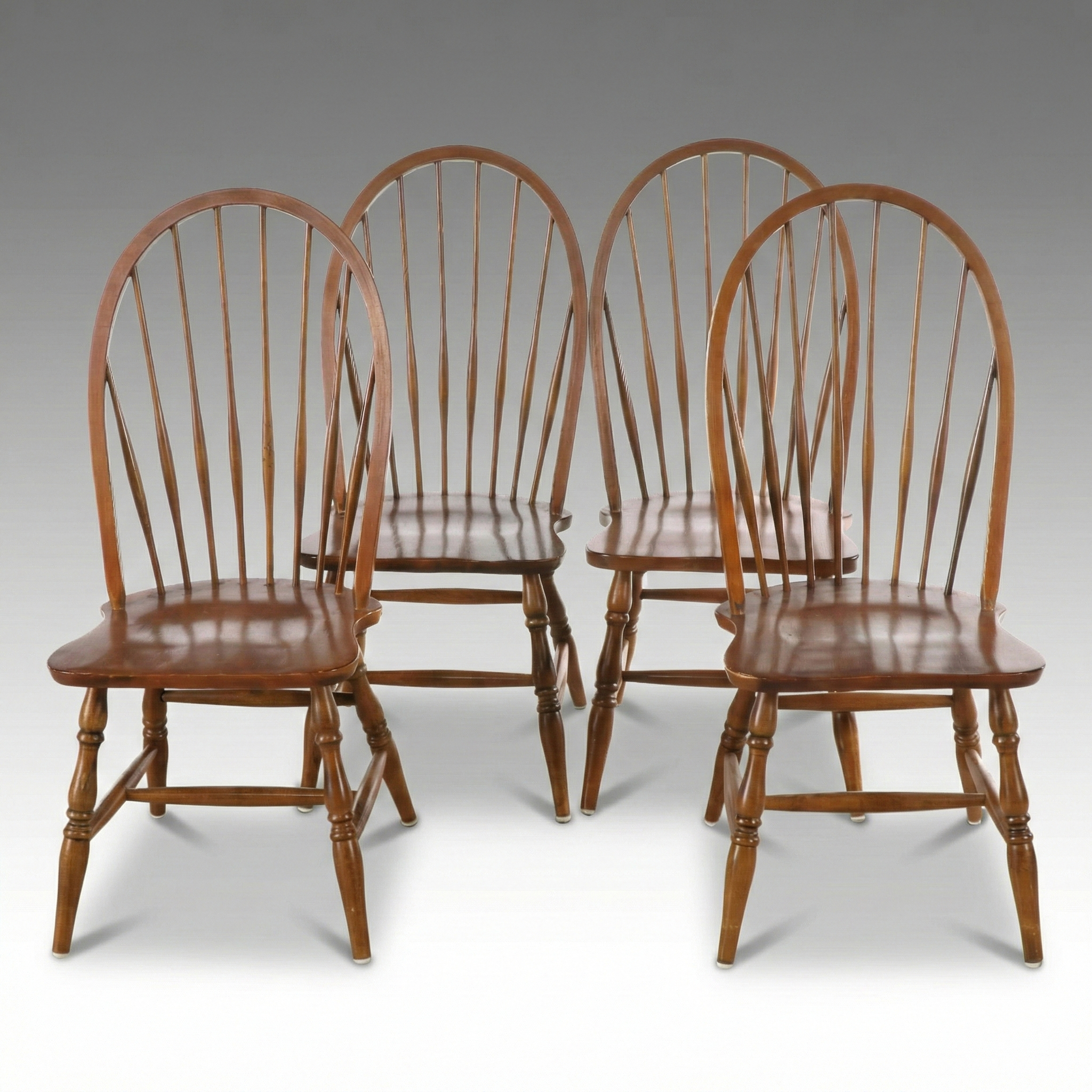 Four Bow-Back Windsor Dining Chairs