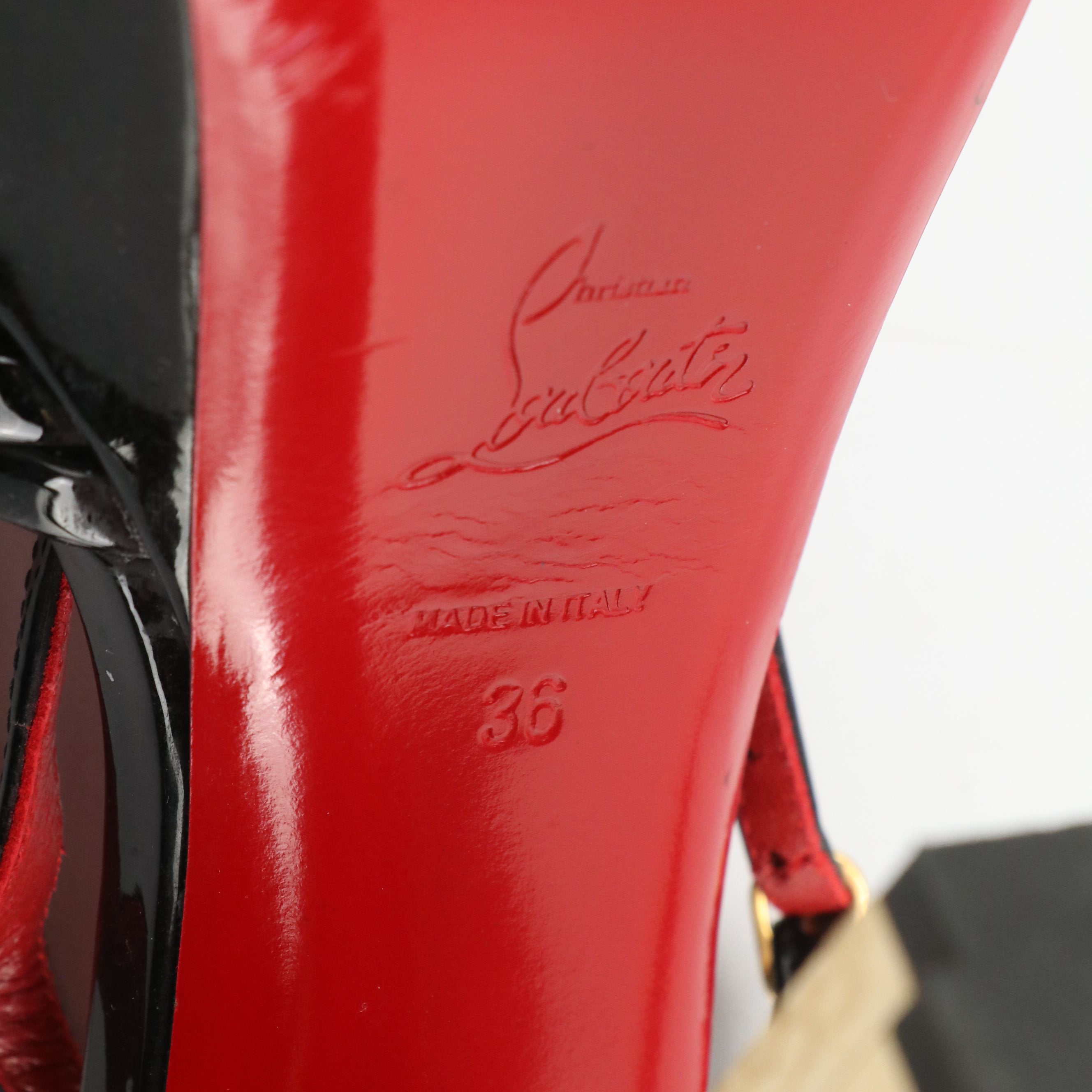 Christian Louboutin Criss-Cross Peep Toe Pumps in Black Patent Leather