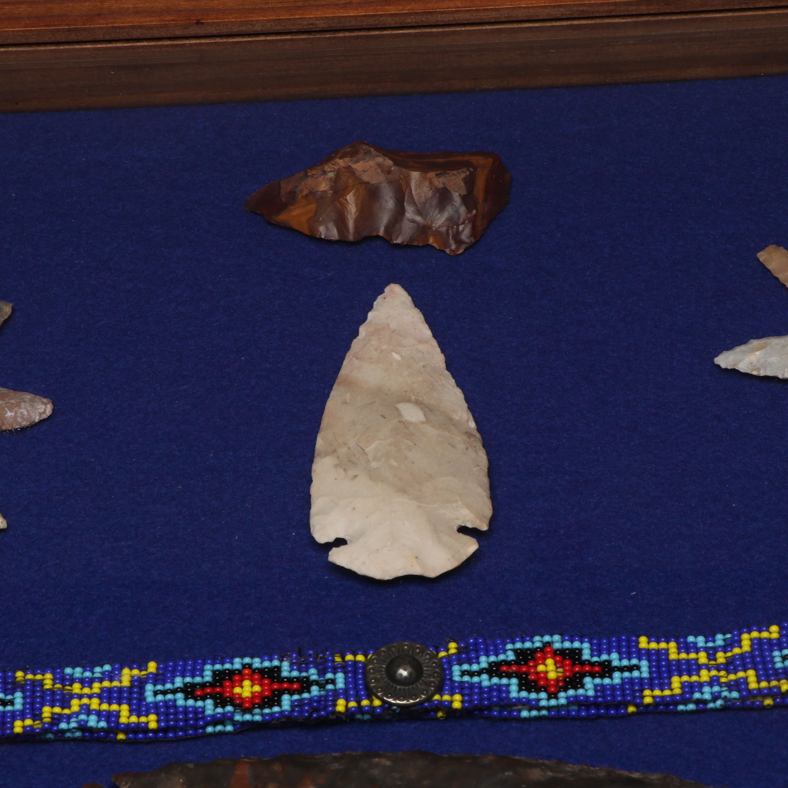 Plains Style Beaded Band with Dovetails and Other Stone Arrowheads and Tools