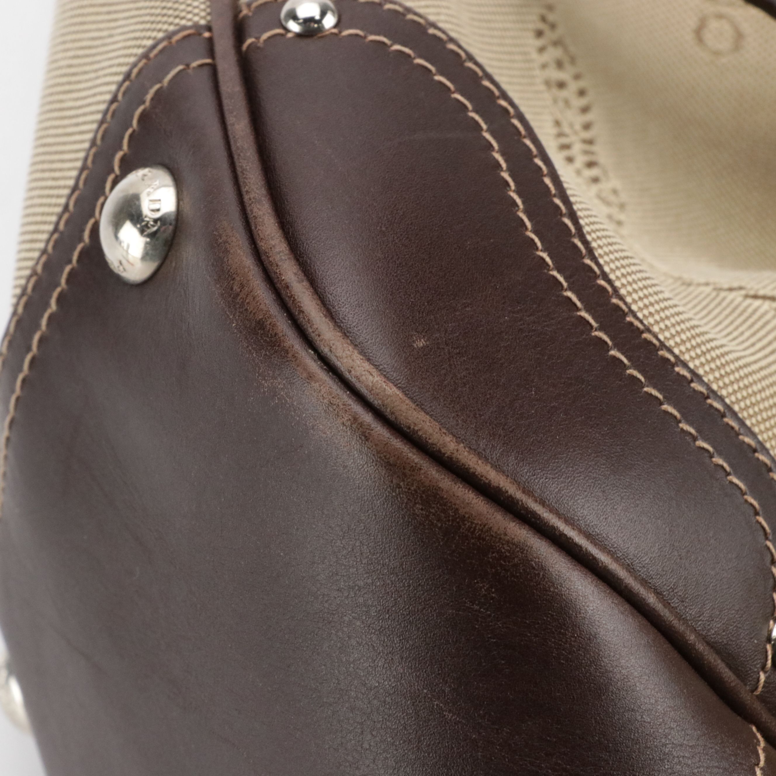 Prada Canapa Logo Side Drawstring Tote in Brown Jacquard Canvas and Leather