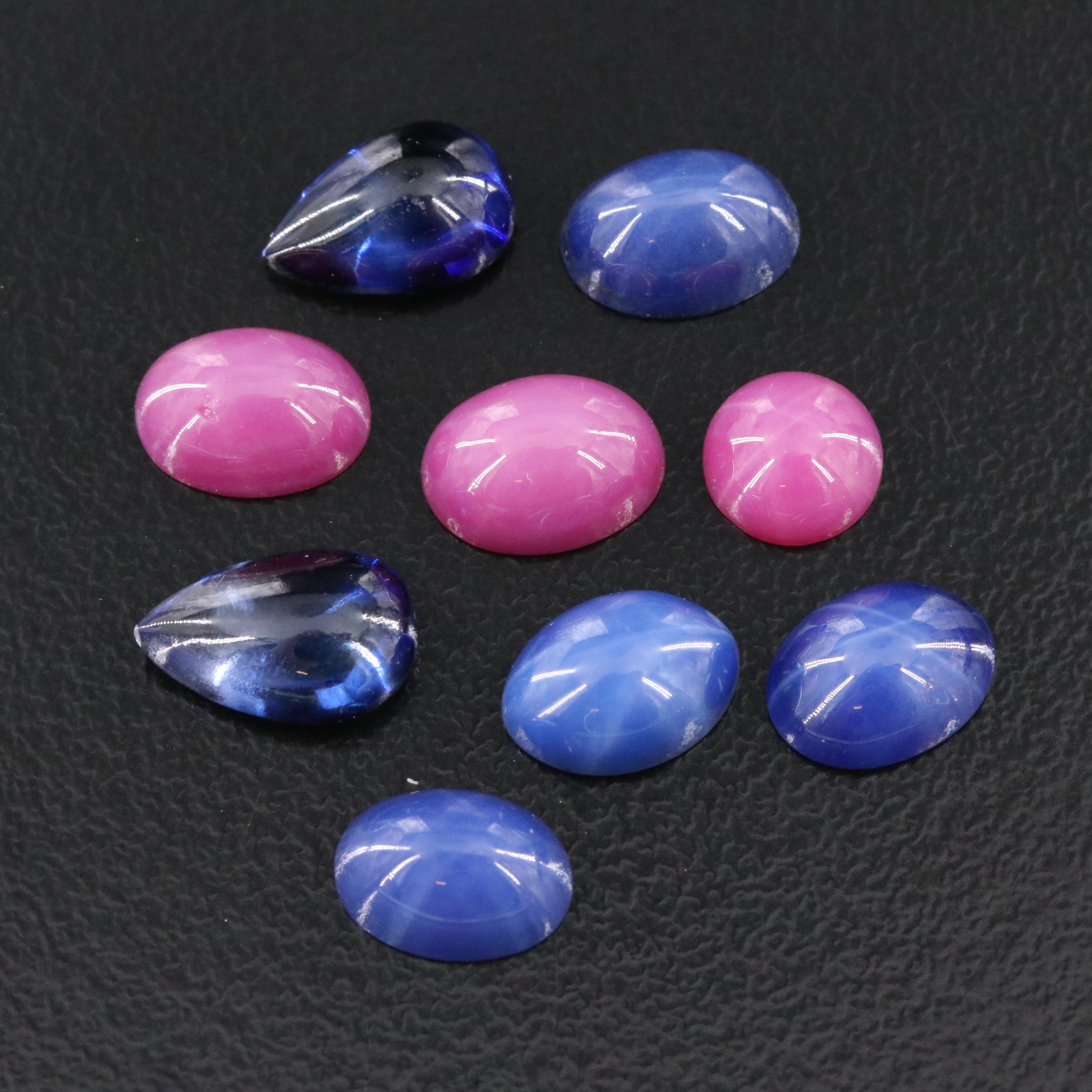 Loose 15.18 CTW Lot Including Lab Grown Star Ruby and Lab Grown Sapphire