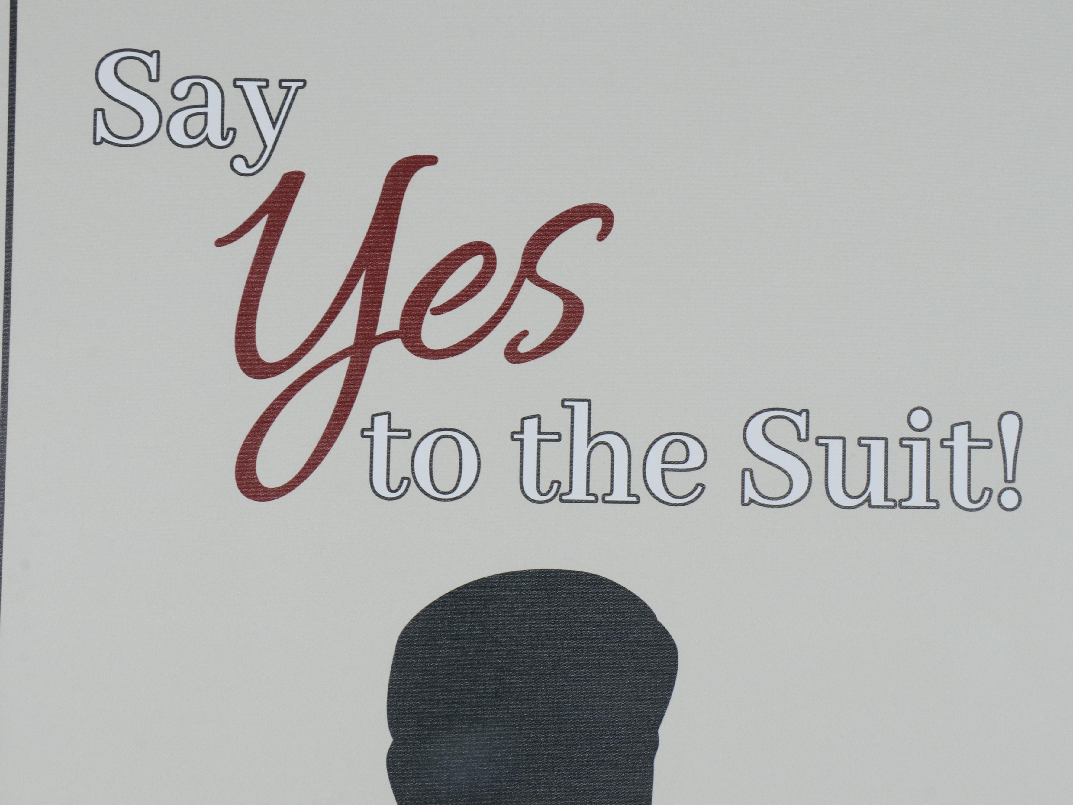 Price Stores Advertisement Roll-Up Sign "Say Yes To The Suit!," 21st Century