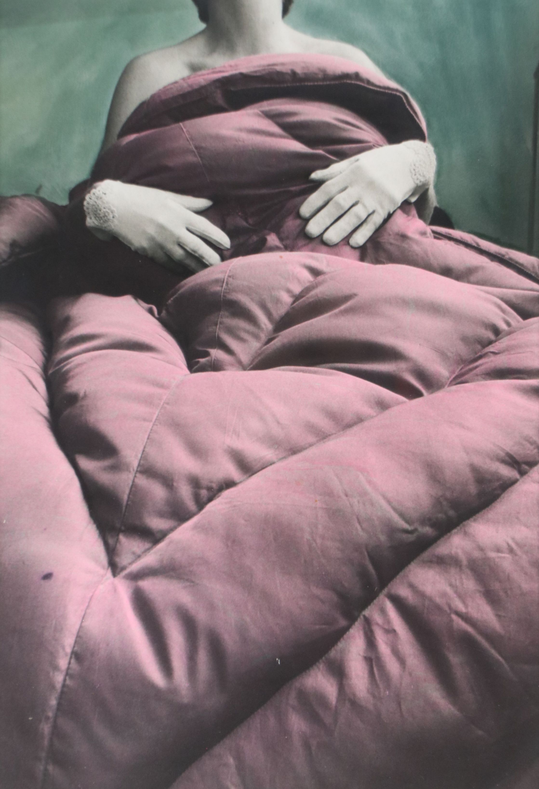 B. Hershey Hand-Tinted Silver Print Under Covers Portrait, 1982