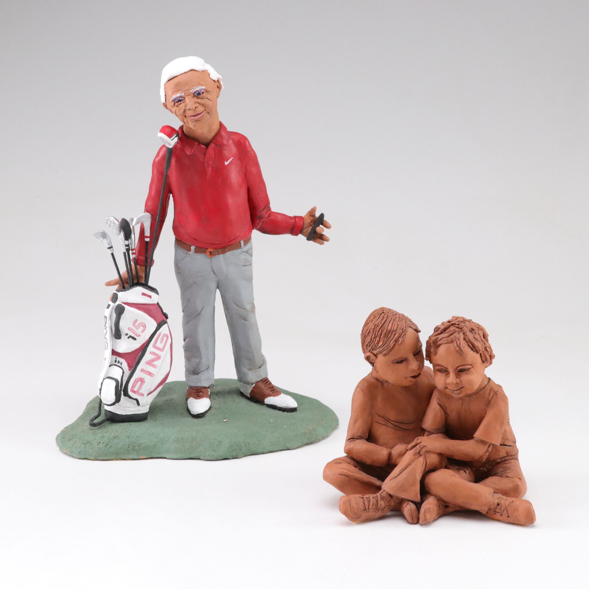 Marilyn T. Reeves Terracotta Sculptures of Golfer and Children Embracing, 2010s