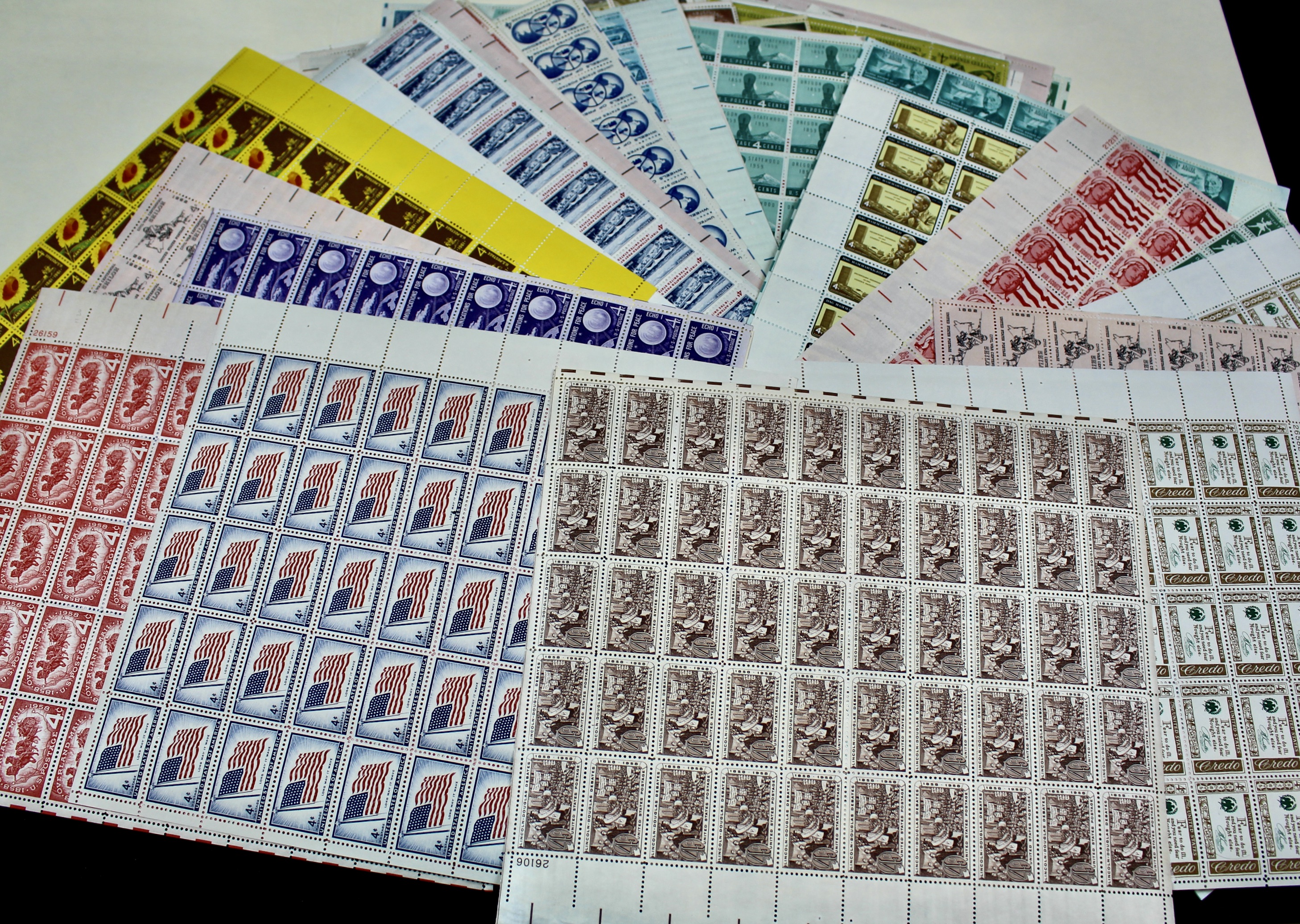 Seventy-Five U.S. 4-Cent Postage Stamp Sheets, 1950s to 1960s