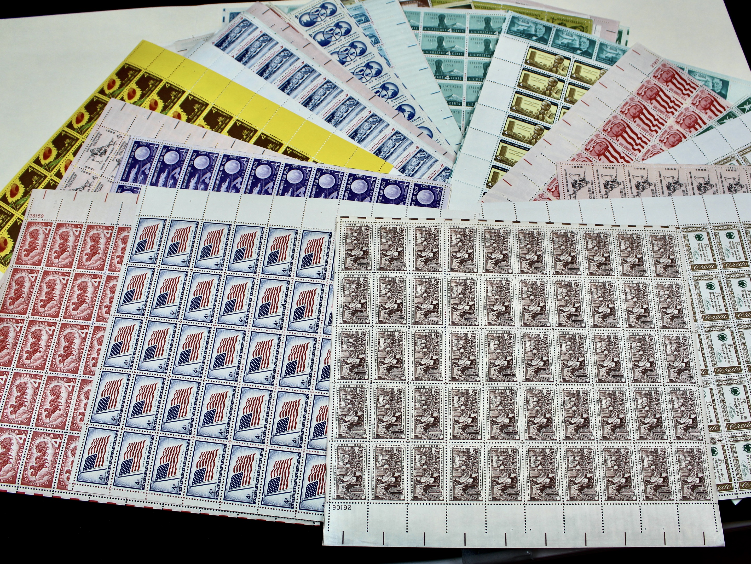 Seventy-Five U.S. 4-Cent Postage Stamp Sheets, 1950s to 1960s