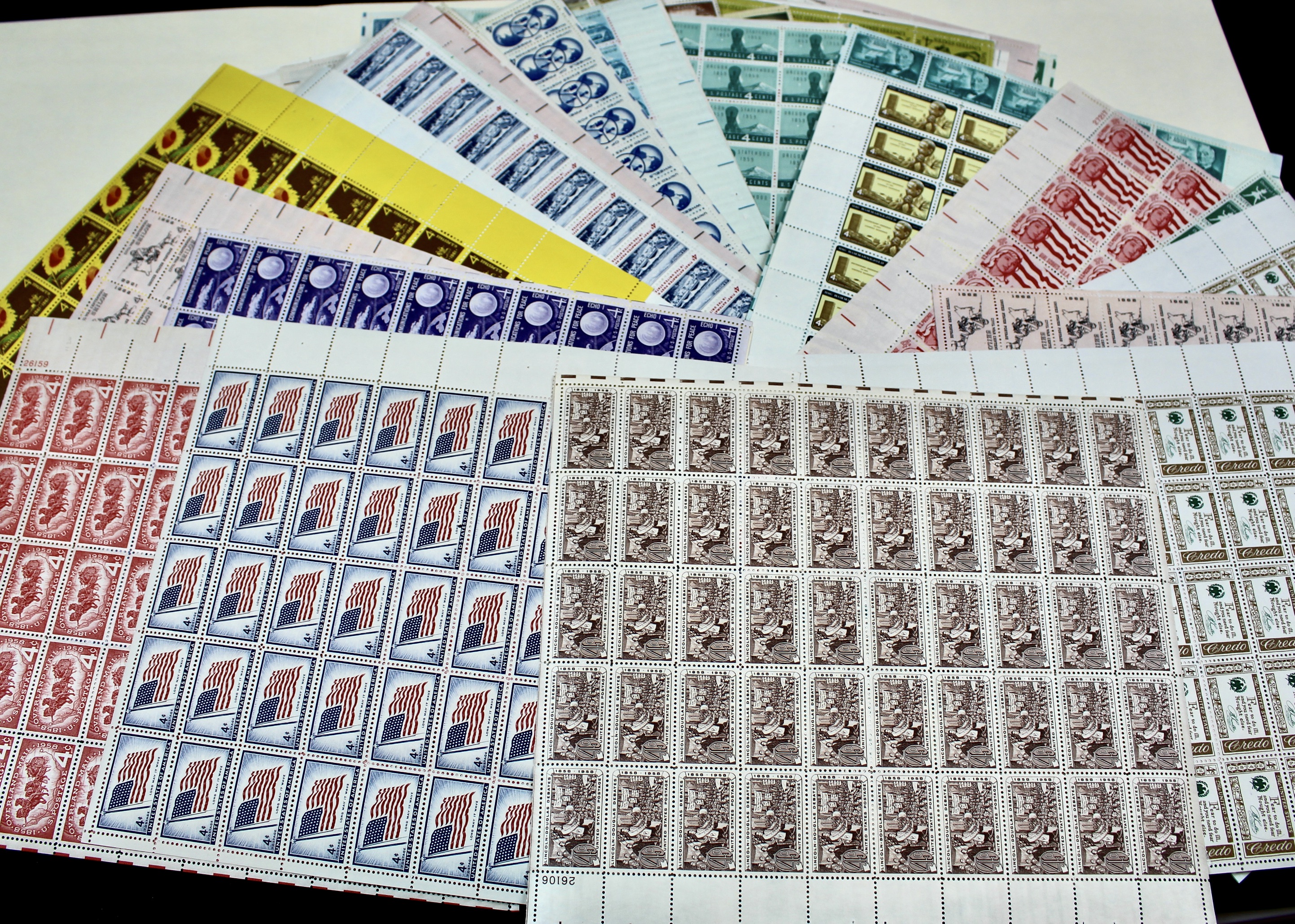 Seventy-Five U.S. 4-Cent Postage Stamp Sheets, 1950s to 1960s