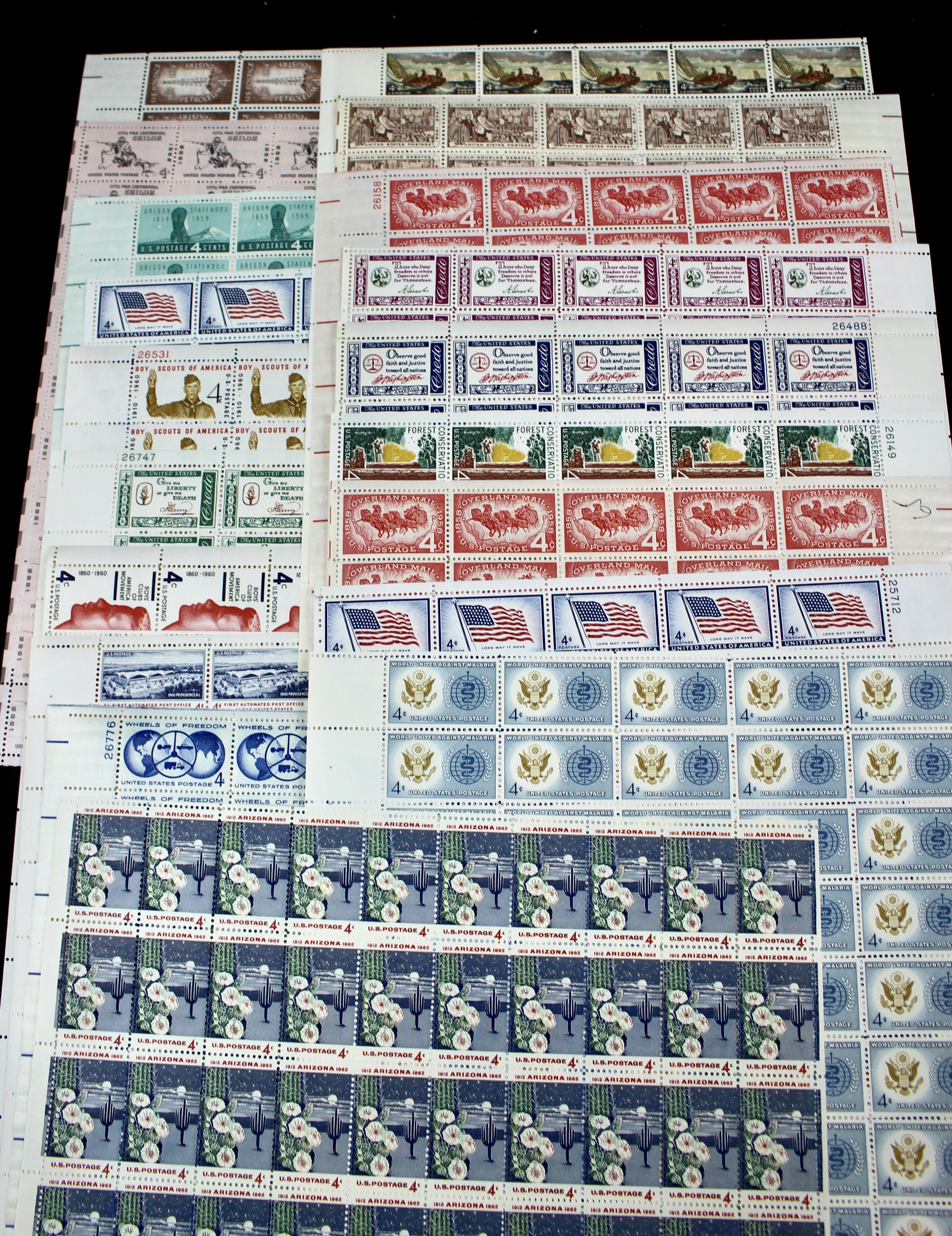 Seventy-Five U.S. 4-Cent Postage Stamp Sheets, 1950s to 1960s