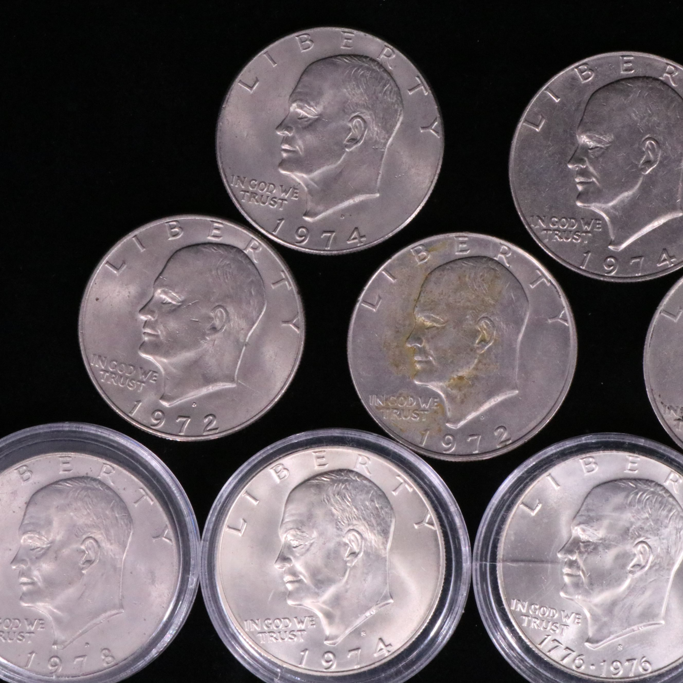 Twelve Mixed Date Eisenhower Dollars
