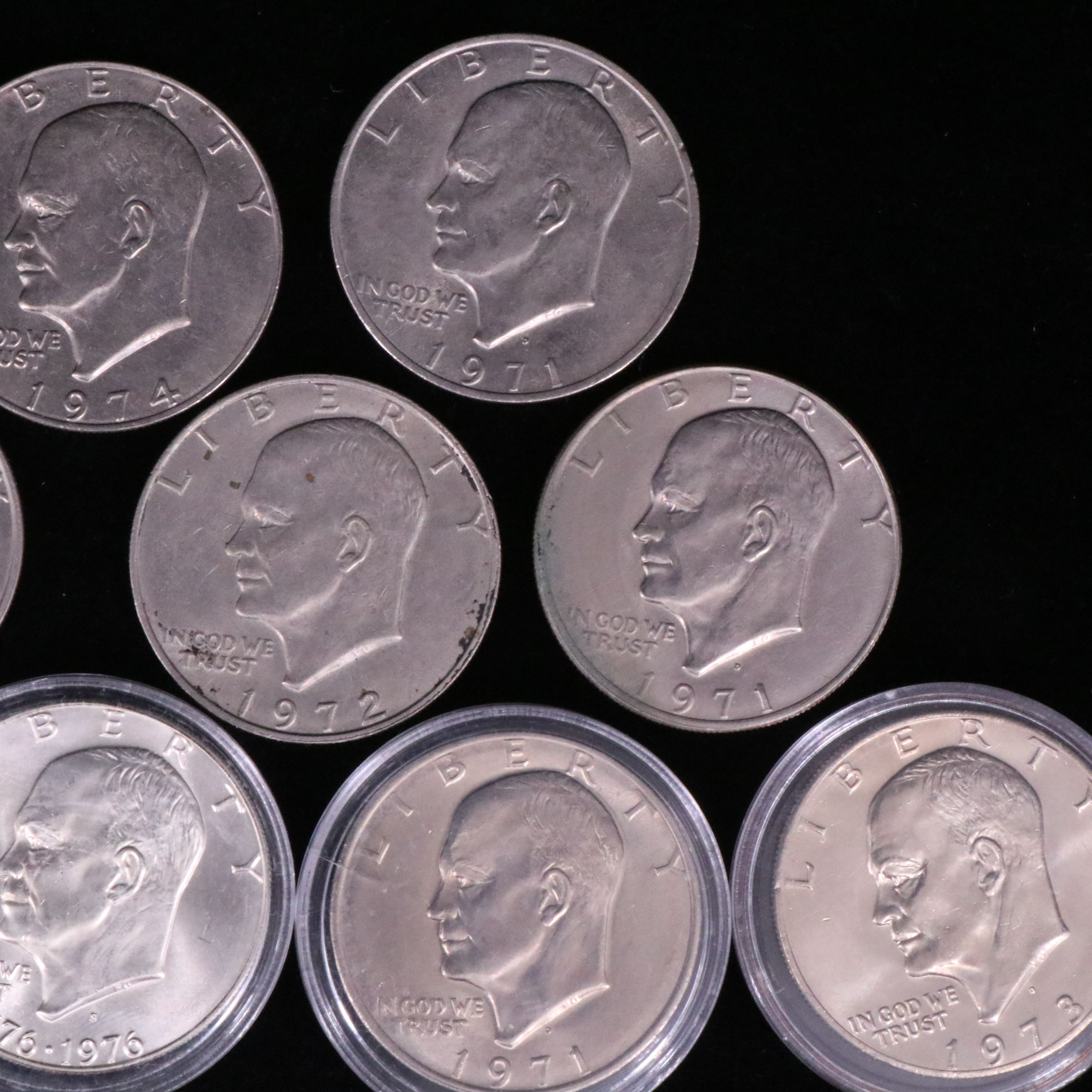 Twelve Mixed Date Eisenhower Dollars