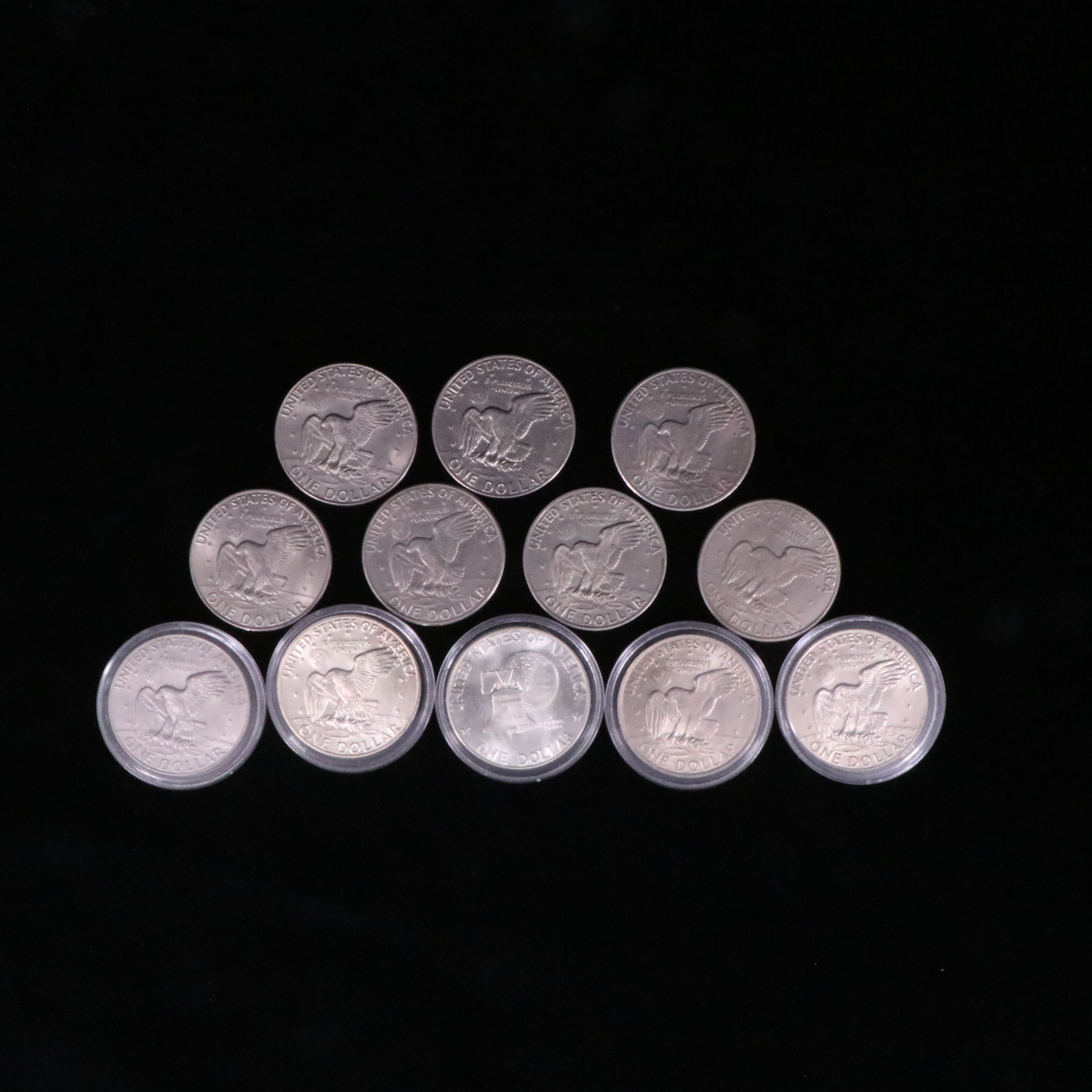 Twelve Mixed Date Eisenhower Dollars