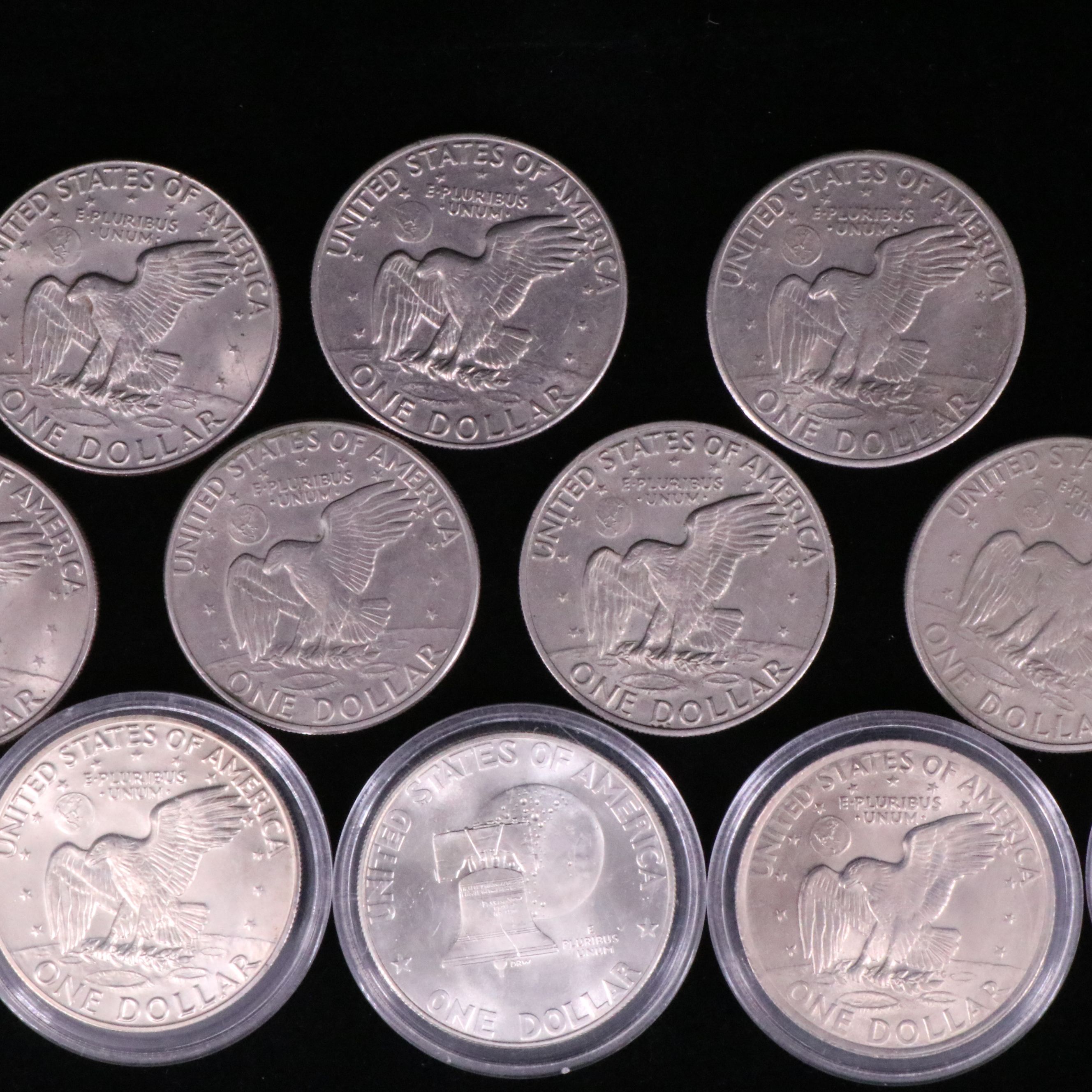 Twelve Mixed Date Eisenhower Dollars