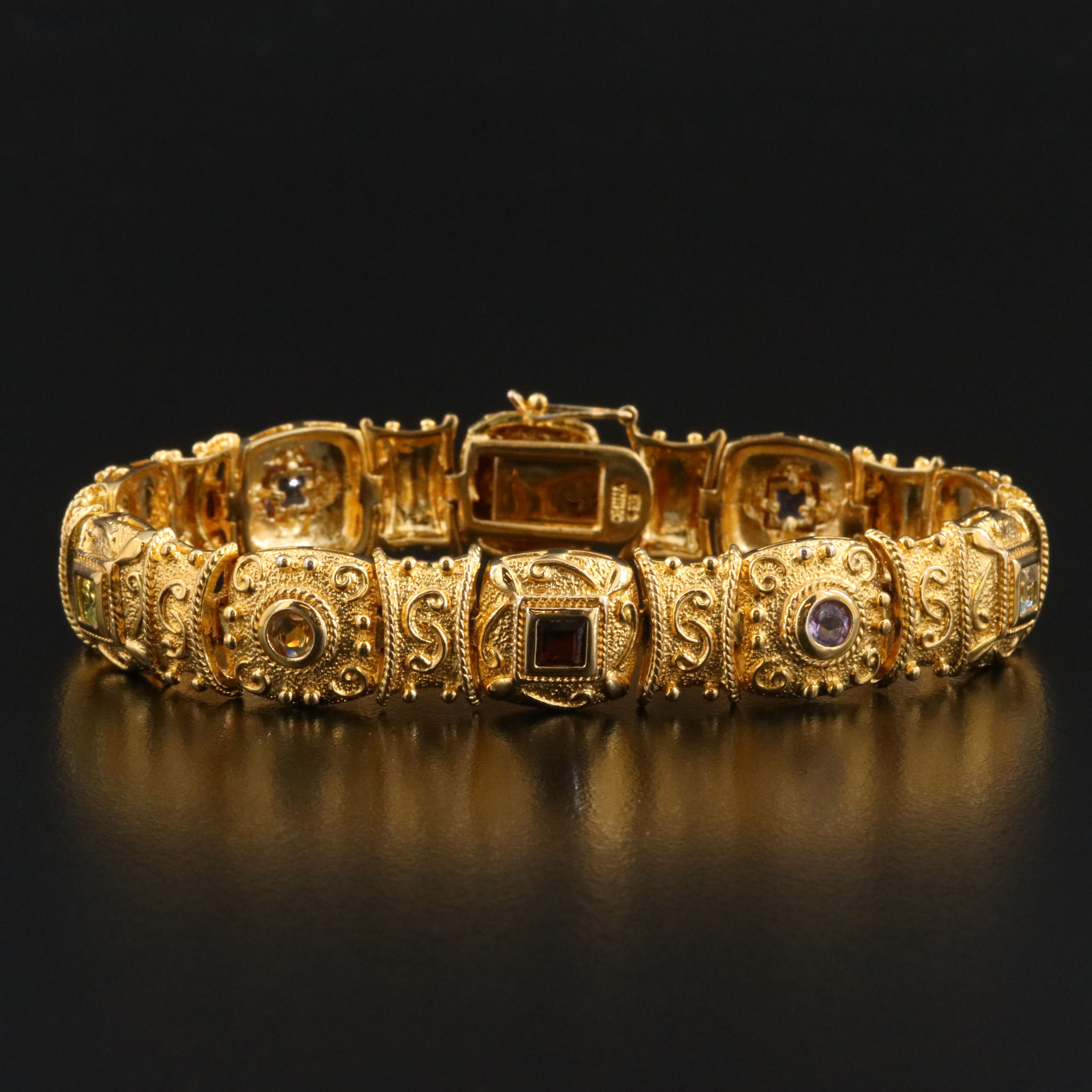 Sterling Panel Bracelet Featuring Garnet, Amethyst, and Blue Topaz