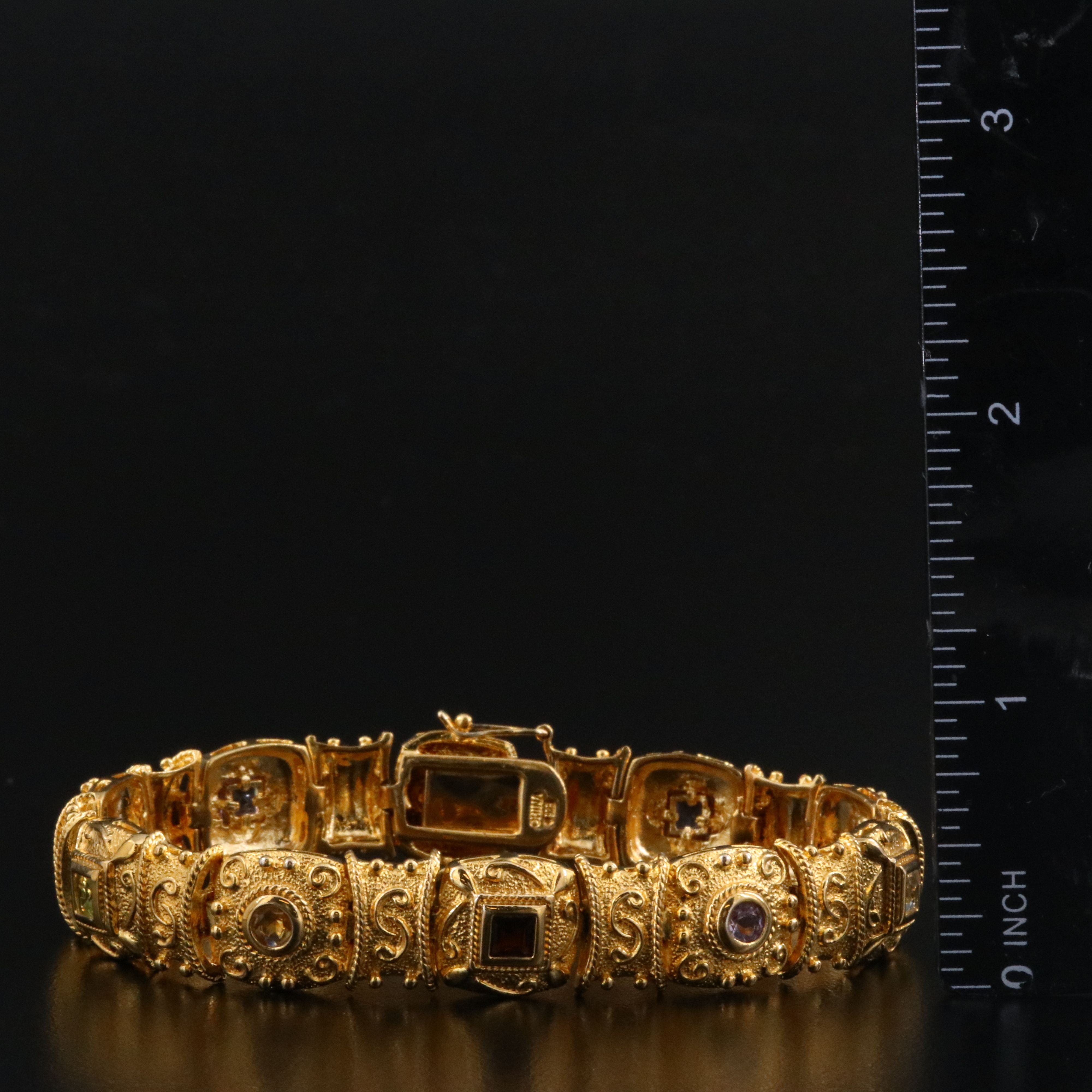 Sterling Panel Bracelet Featuring Garnet, Amethyst, and Blue Topaz