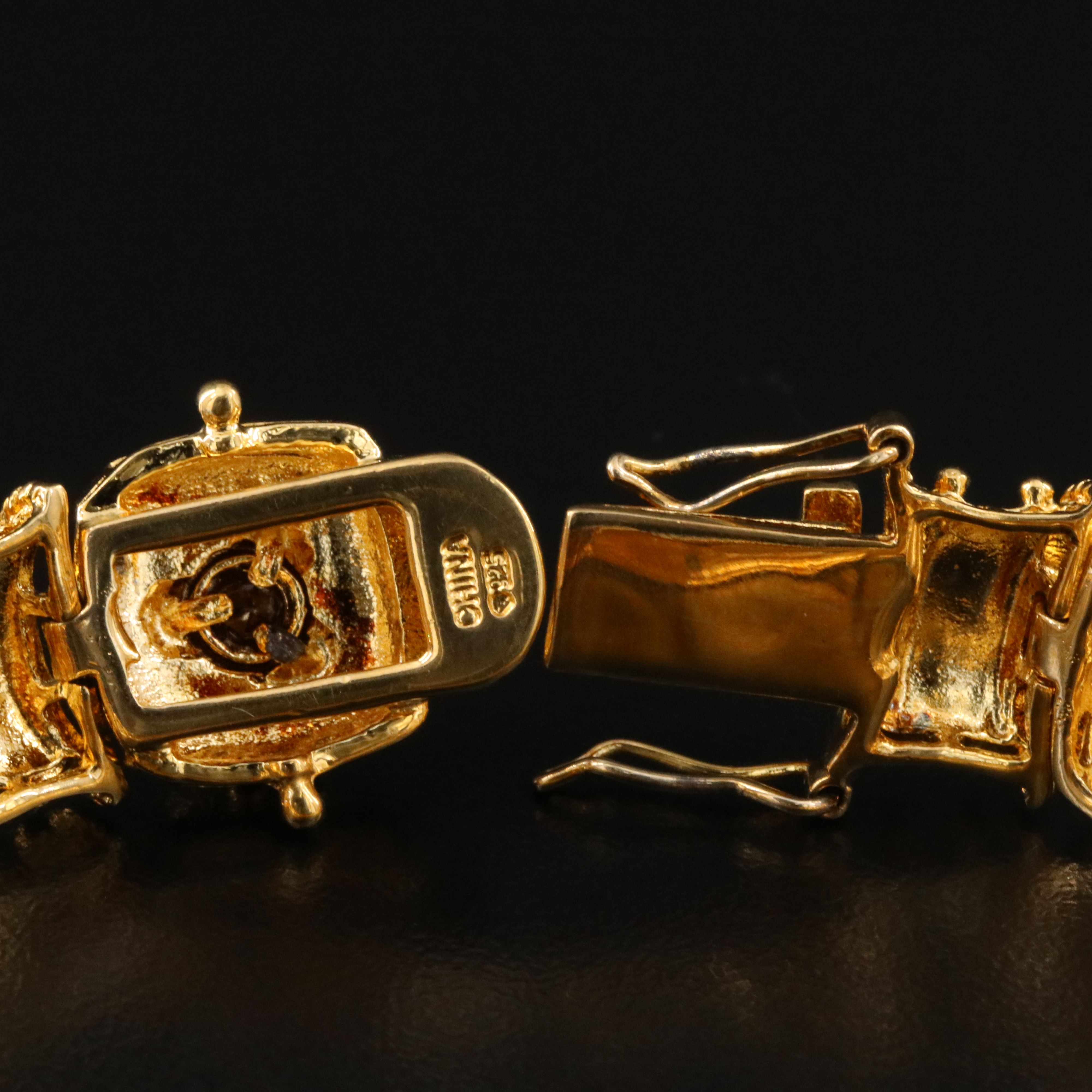 Sterling Panel Bracelet Featuring Garnet, Amethyst, and Blue Topaz