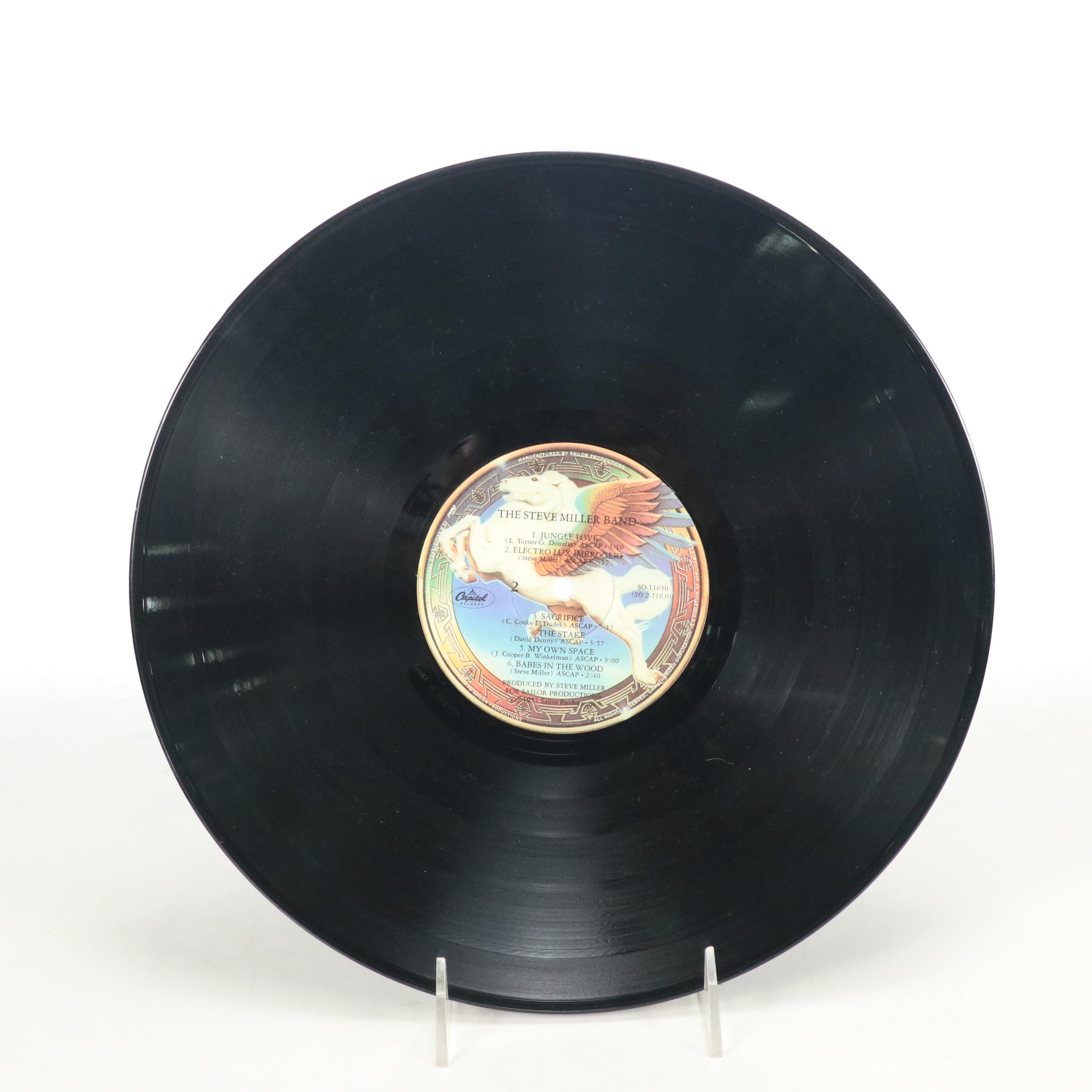 Van Morrison, John Kay, The Doors, and More Vinyl Record Albums