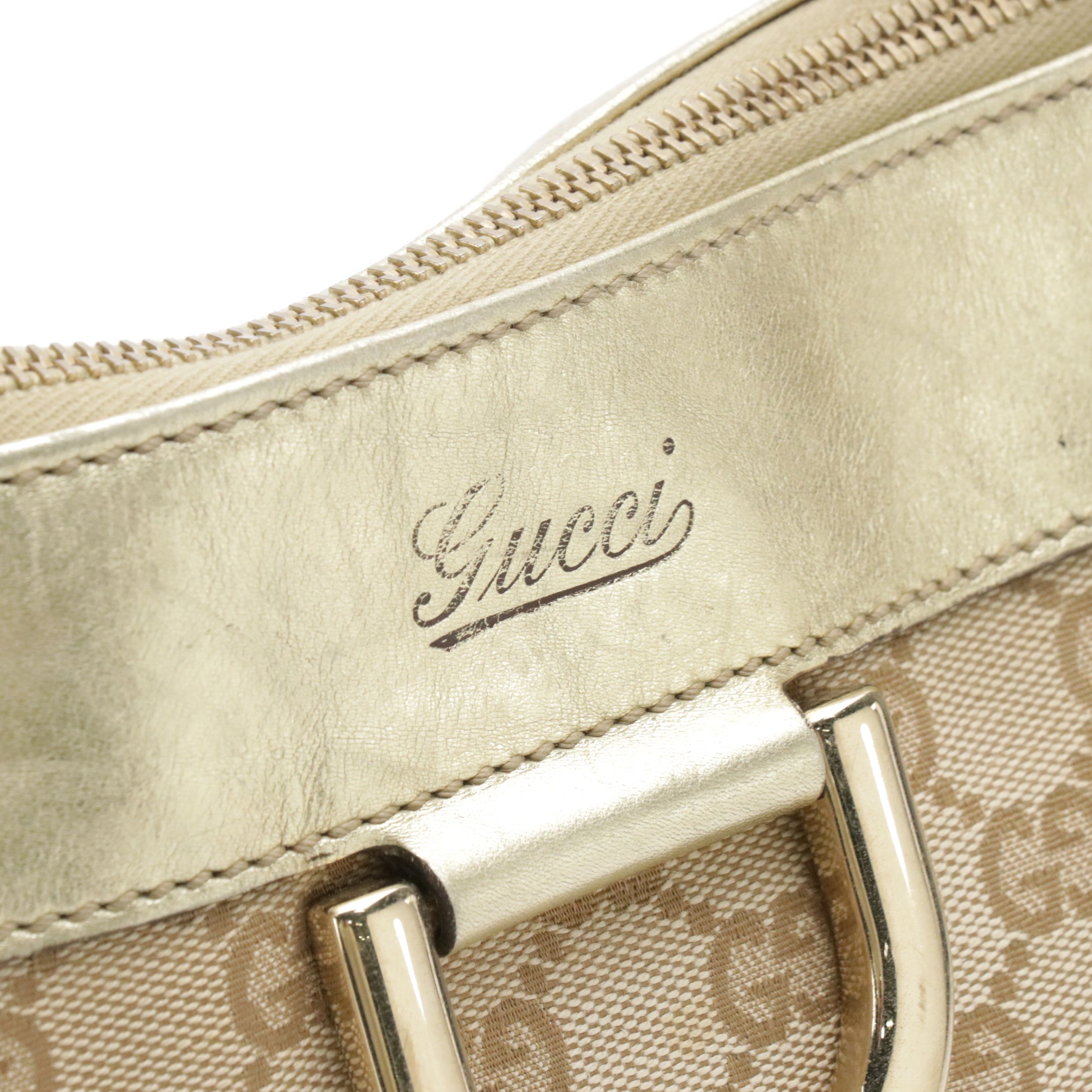 Gucci Abbey D-Ring Zip Tote in GG Canvas and Metallic Gold Calfskin Leather