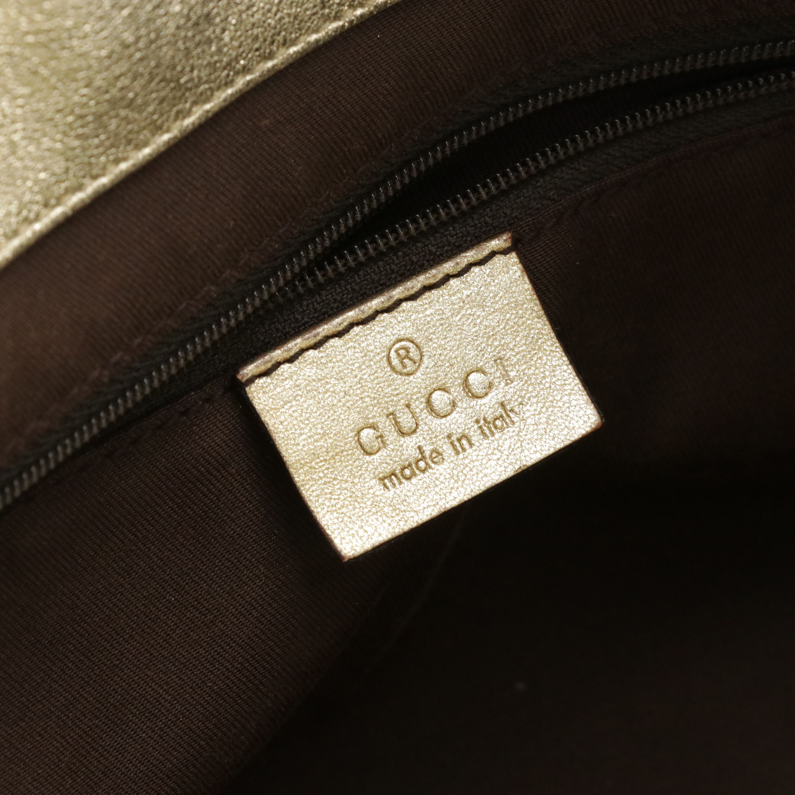 Gucci Abbey D-Ring Zip Tote in GG Canvas and Metallic Gold Calfskin Leather