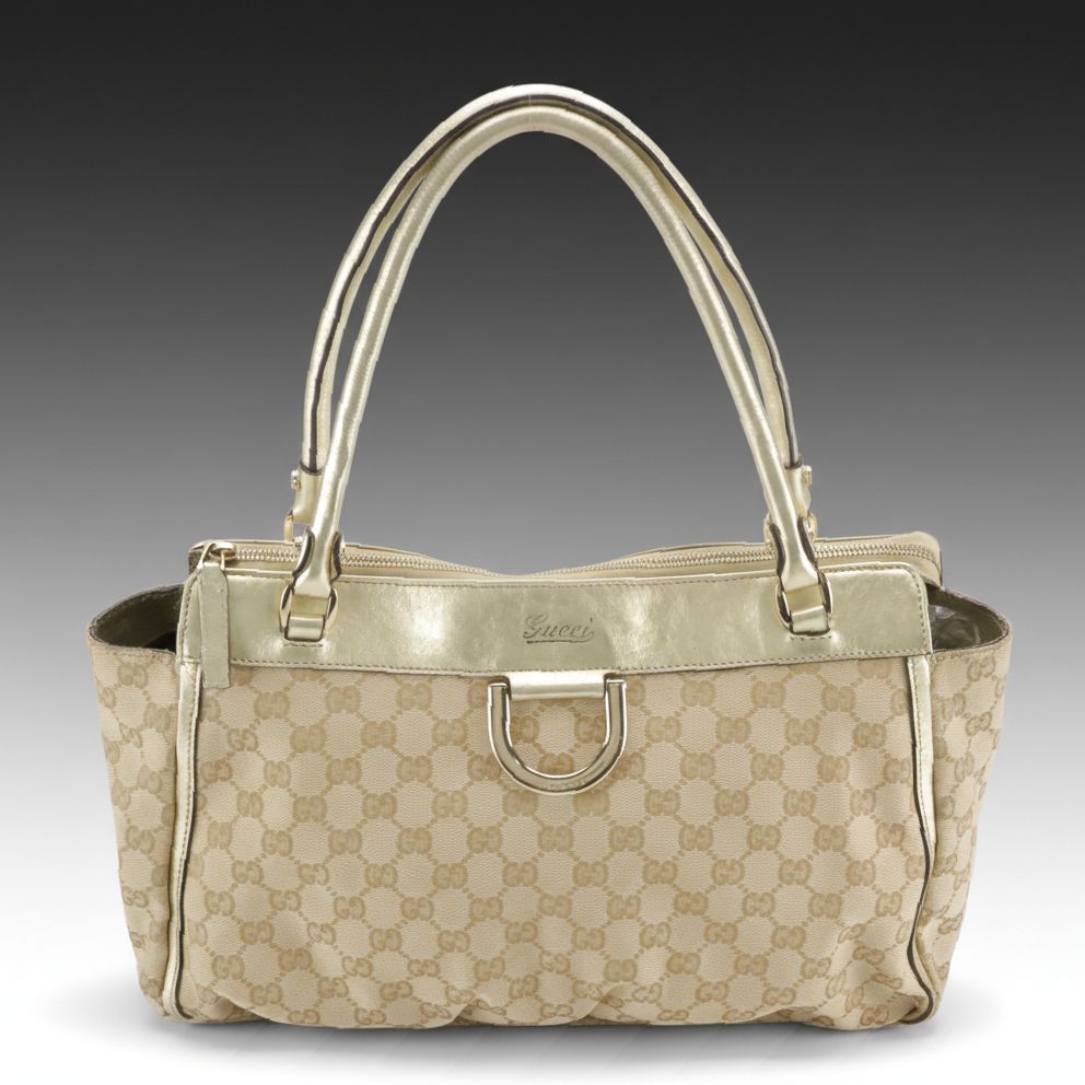 Gucci Abbey D-Ring Zip Tote in GG Canvas and Metallic Gold Calfskin Leather