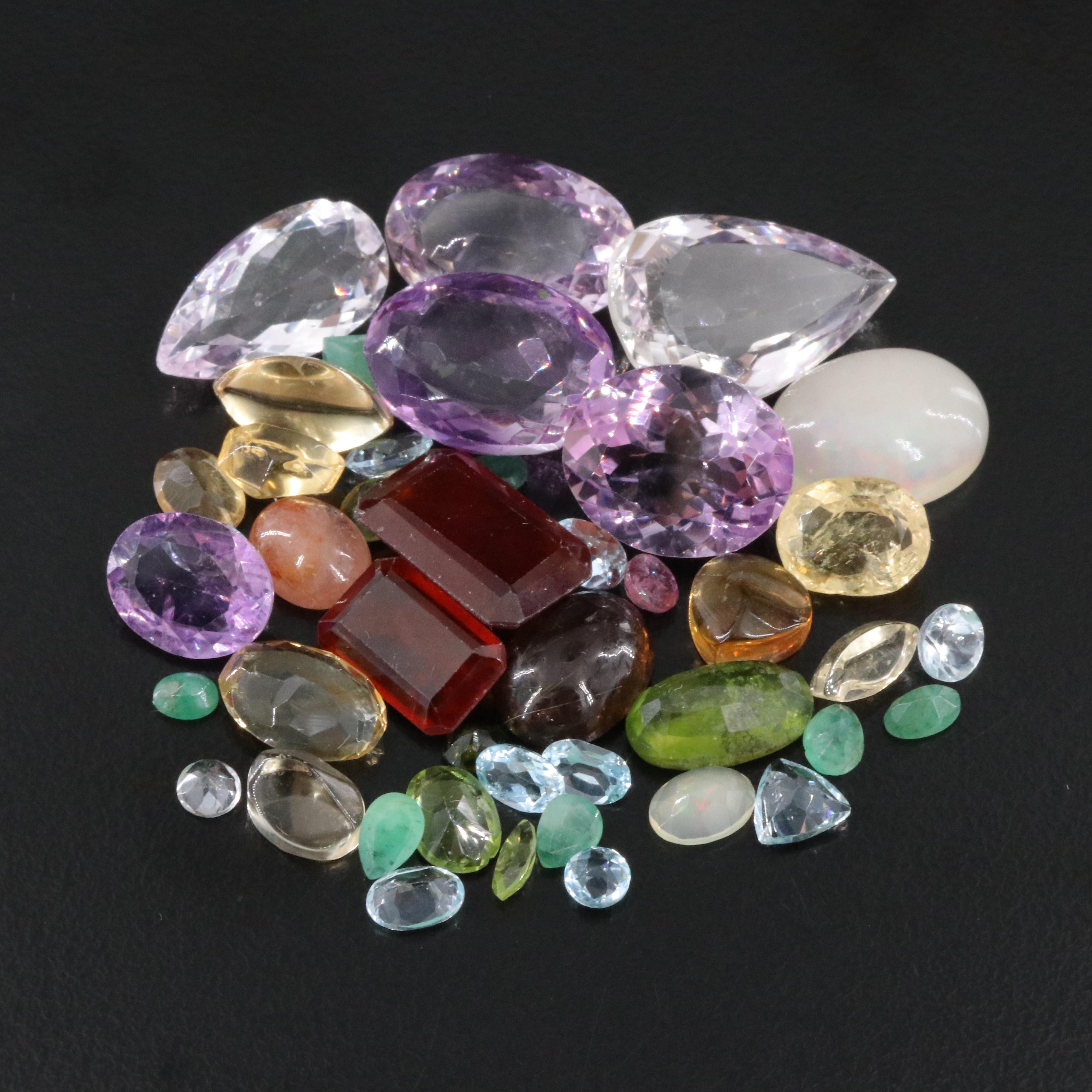 Loose 95.22 CTW Gemstone Lot Including Citrine, Amethsyt and Emerald