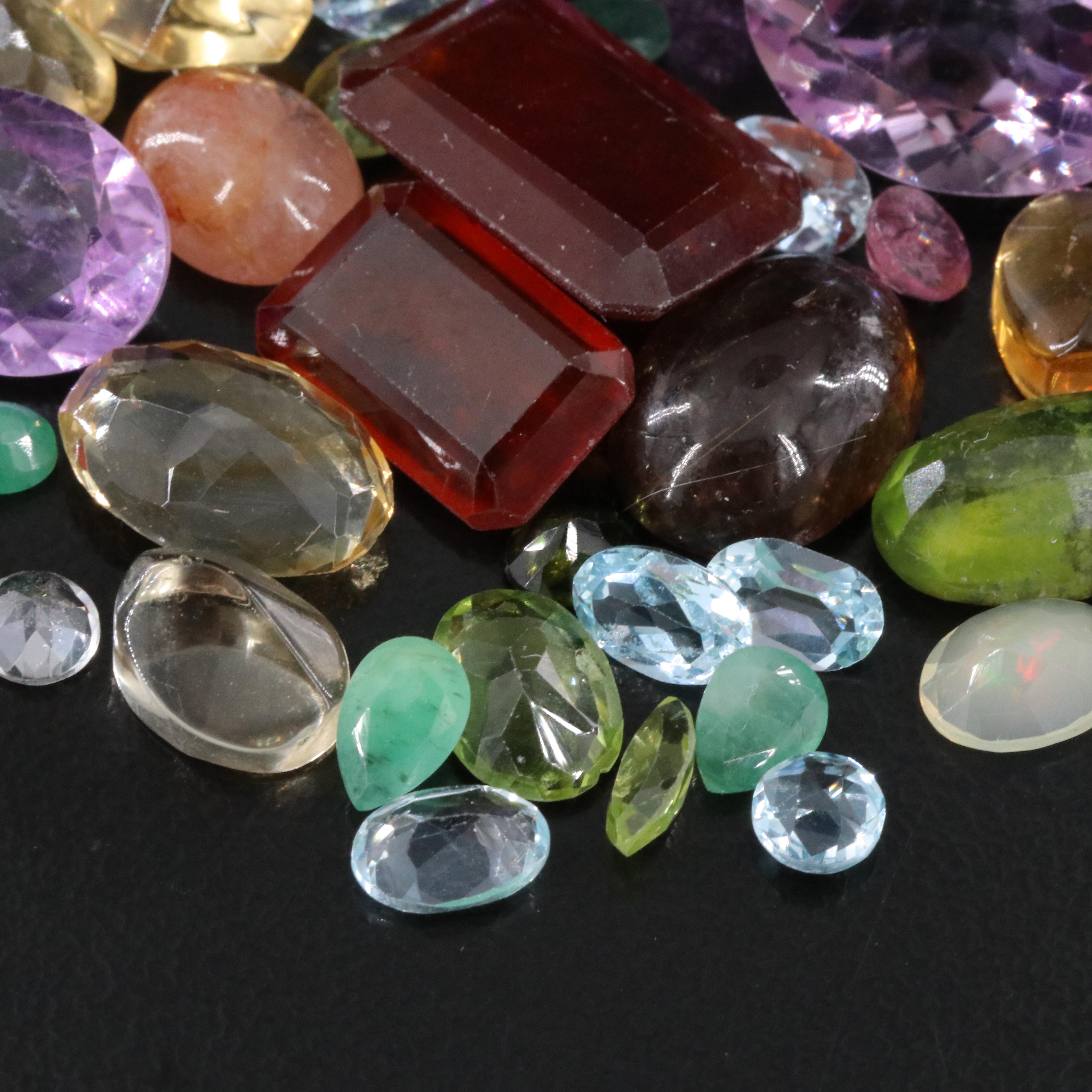 Loose 95.22 CTW Gemstone Lot Including Citrine, Amethsyt and Emerald