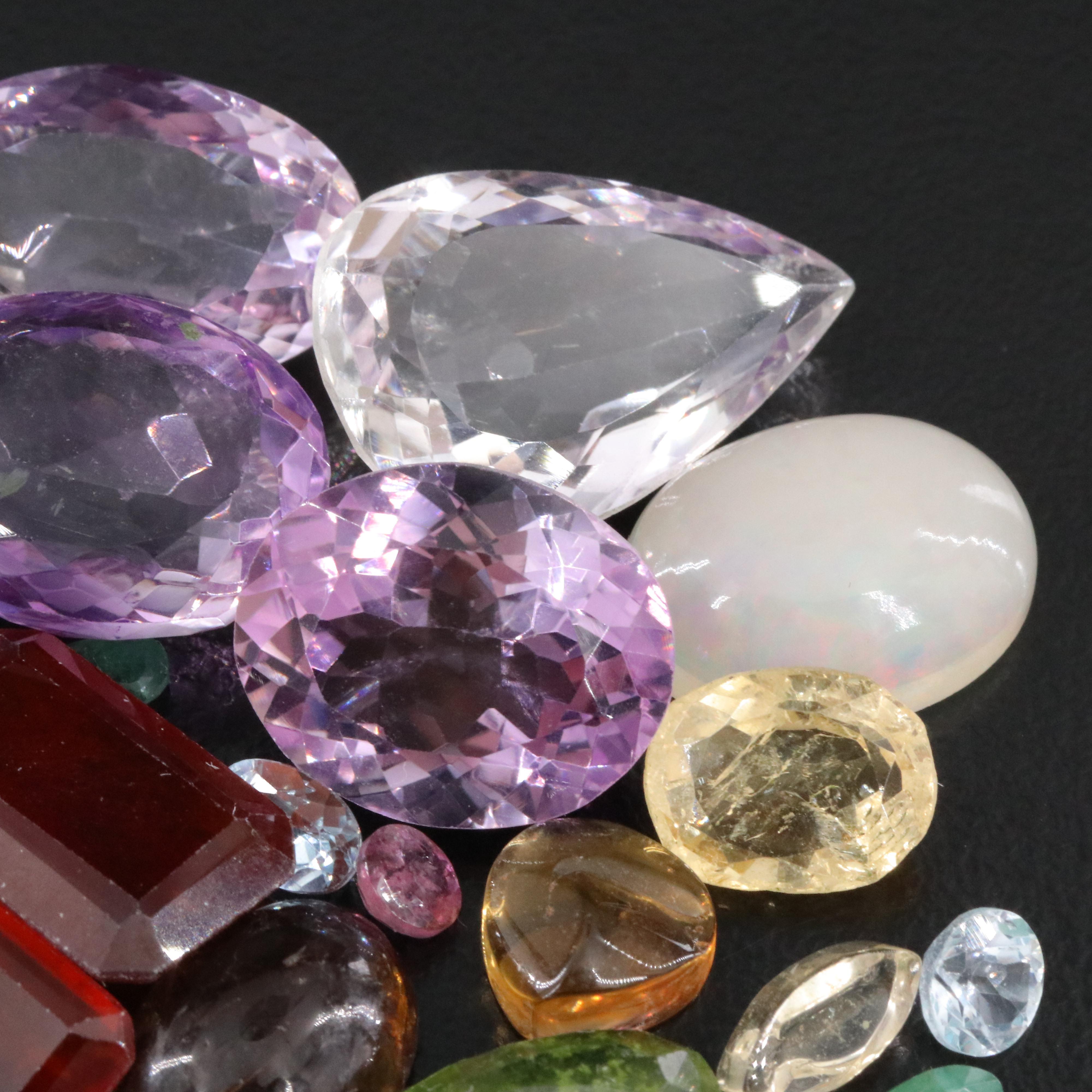 Loose 95.22 CTW Gemstone Lot Including Citrine, Amethsyt and Emerald