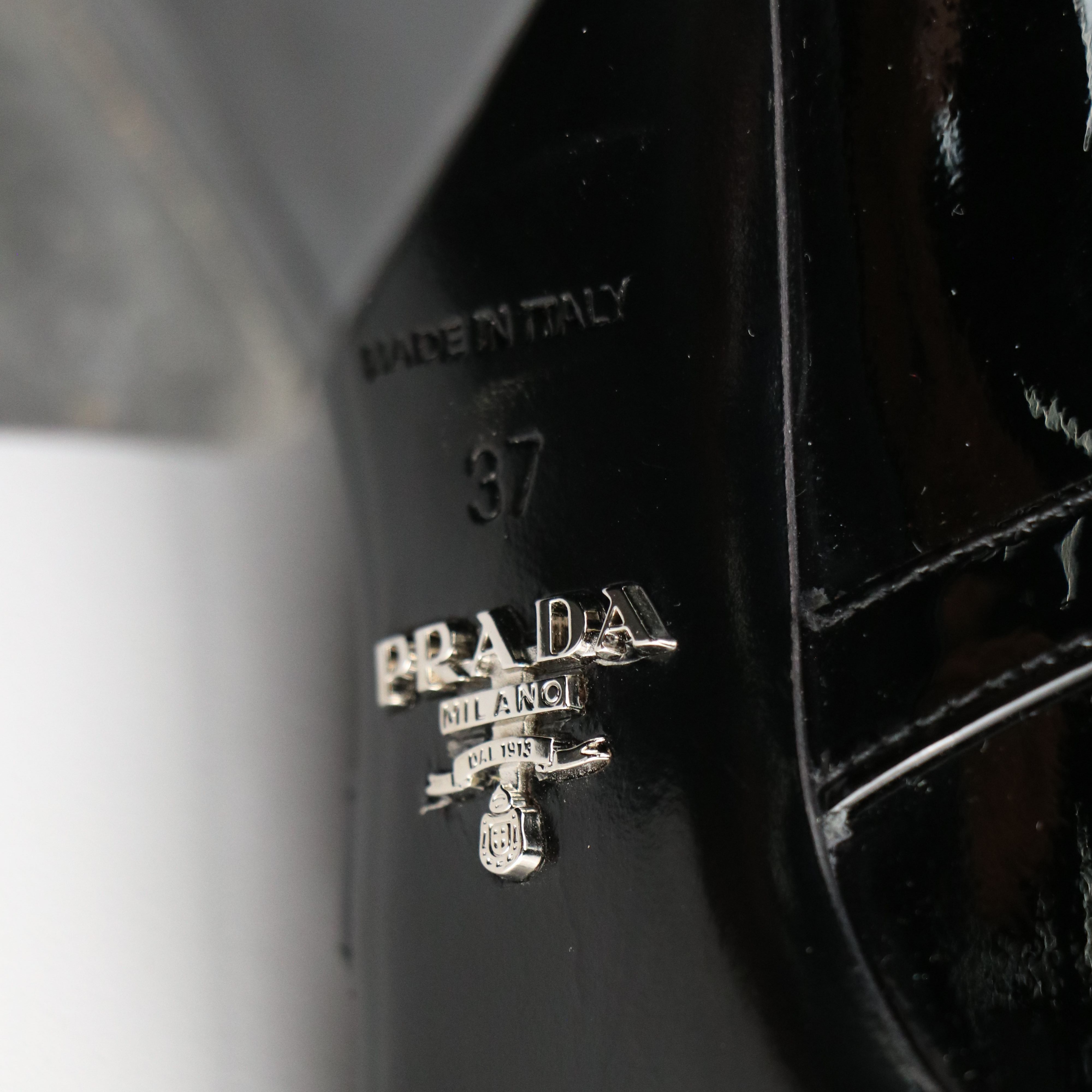 Prada Buckle-Detailed Block Heel Booties Boots in Shiny Black Patent Leather