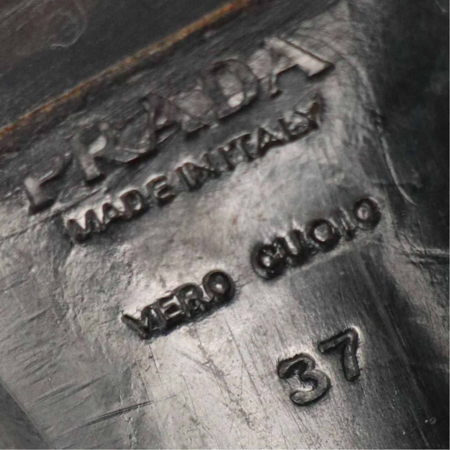 Prada Pointed-Toe Mid-Calf Boots in Black Lambskin Leather with Buckle Details