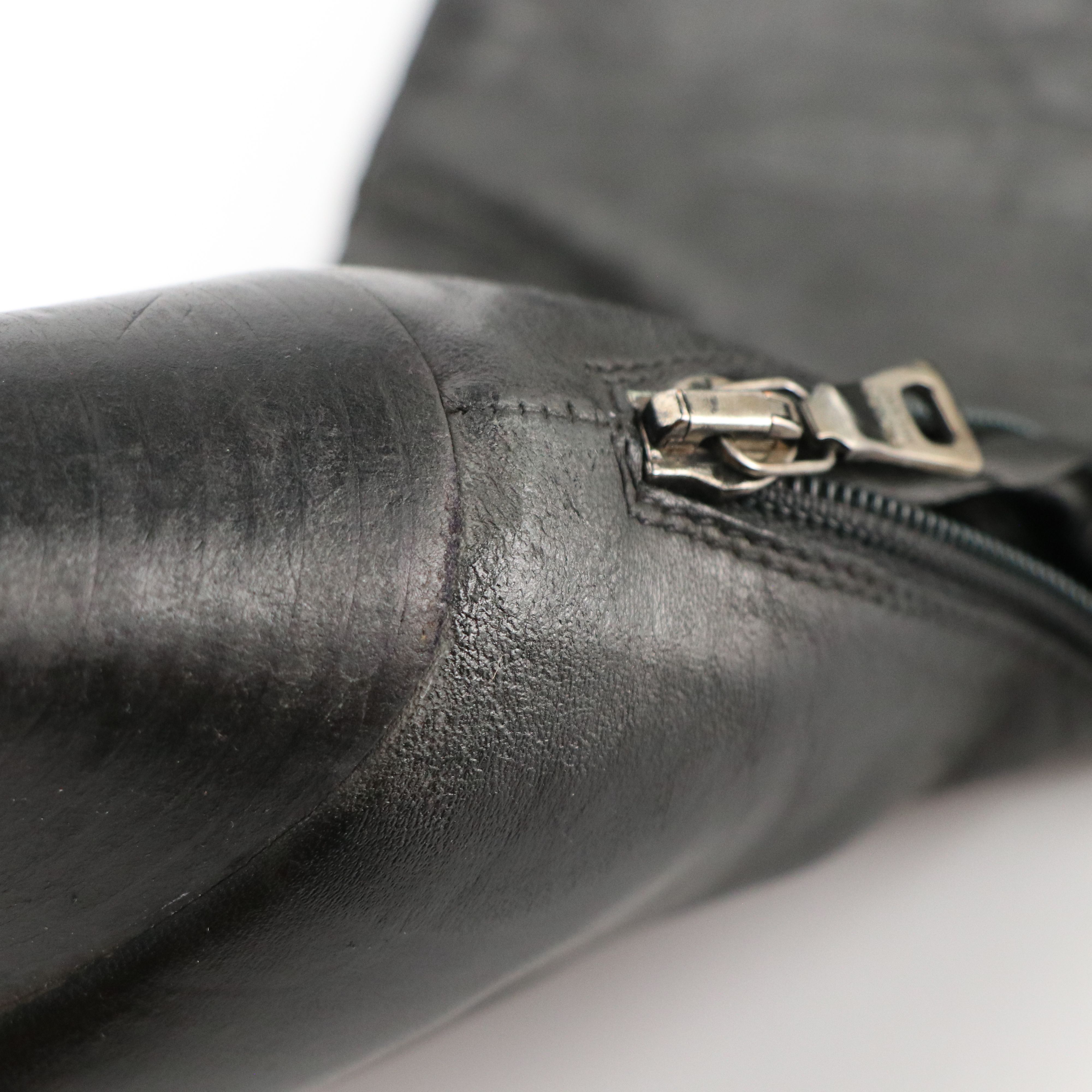 Prada Pointed-Toe Mid-Calf Boots in Black Lambskin Leather with Buckle Details