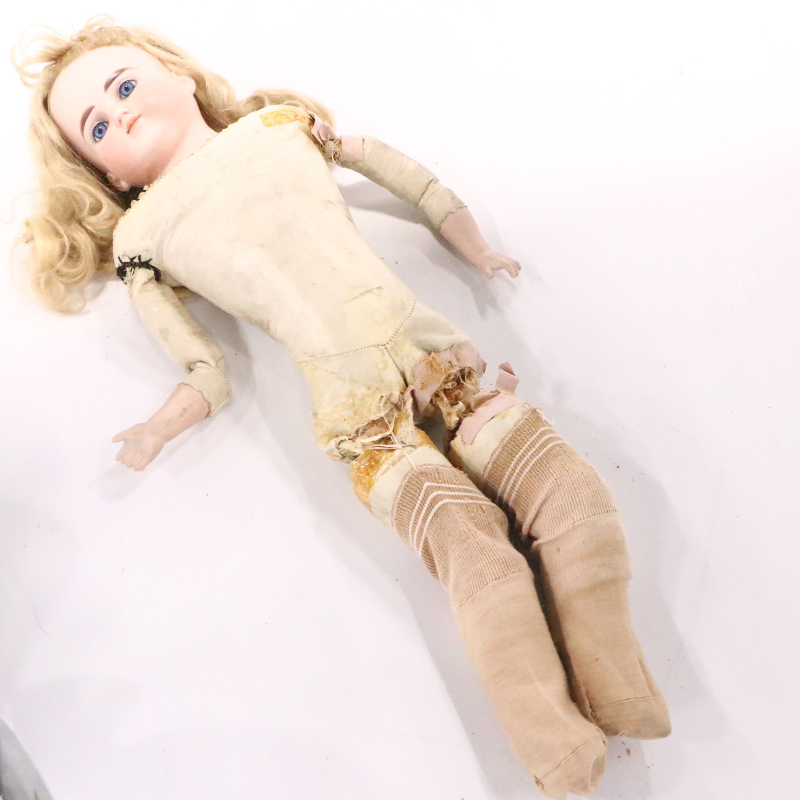 German Bisque Lady Doll with Molded Blonde Hair and Collar with Other Dolls