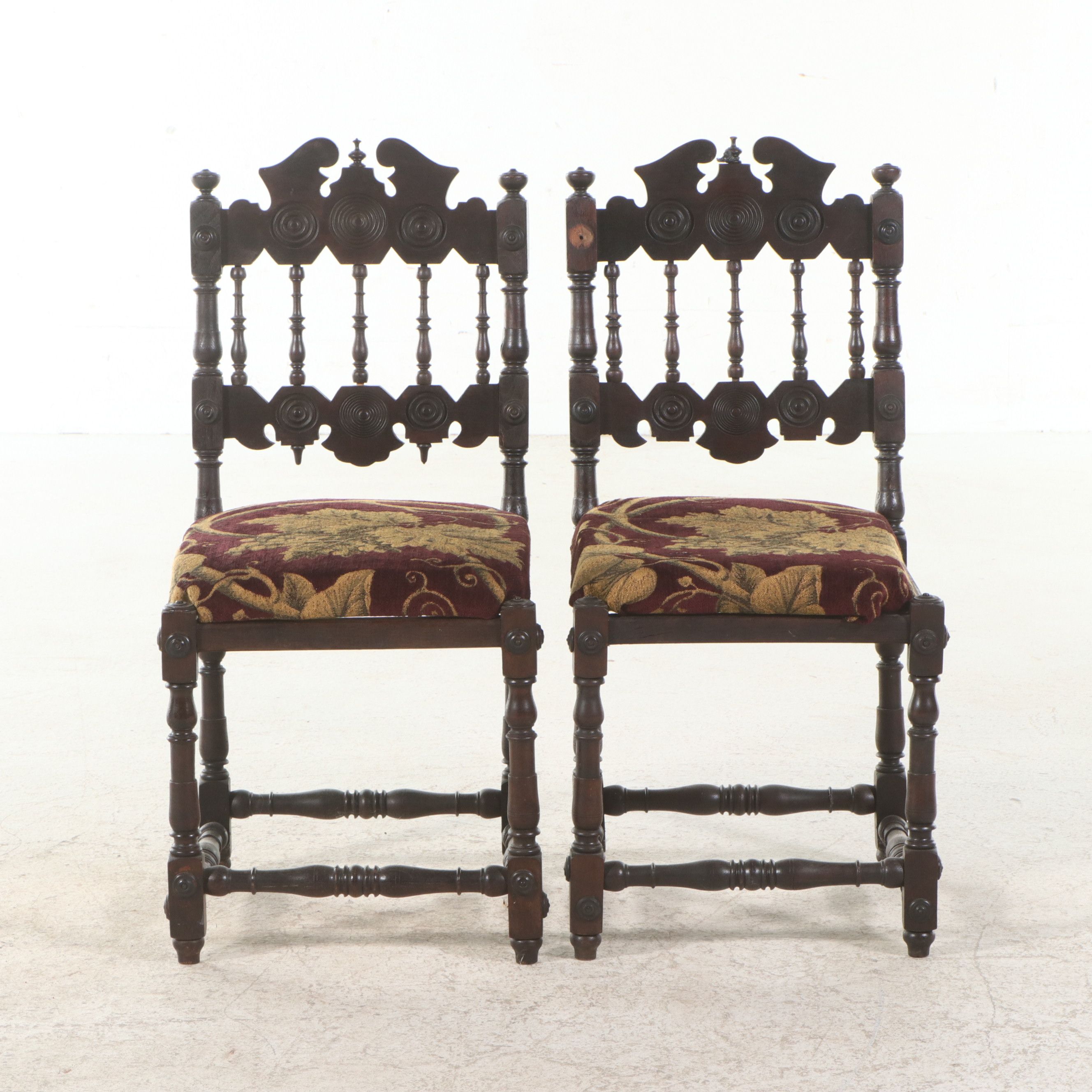 Pair of Spanish Colonial Revival Carved Oak Hall Chairs