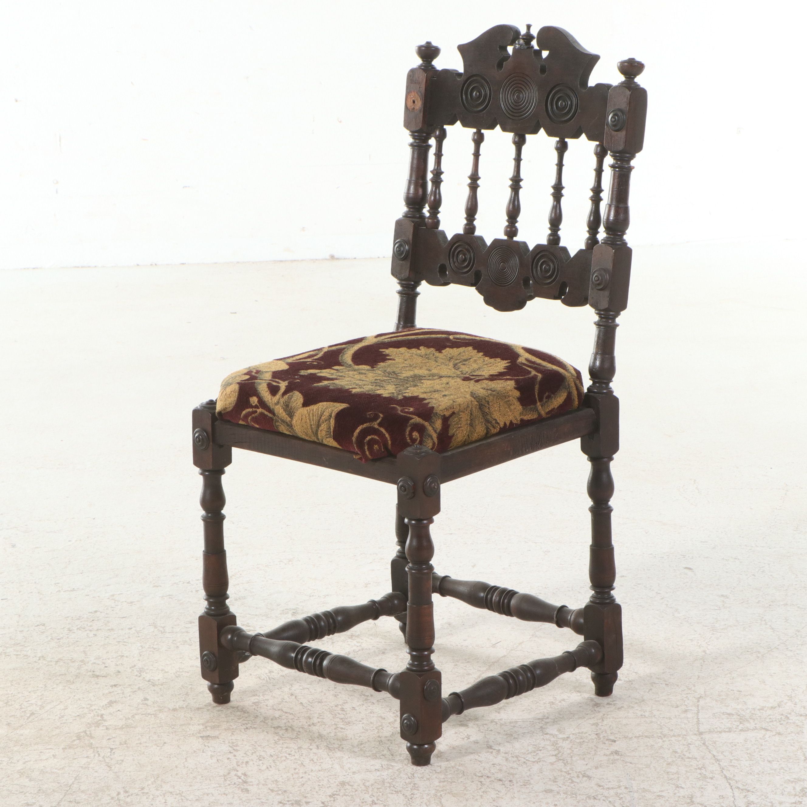 Pair of Spanish Colonial Revival Carved Oak Hall Chairs