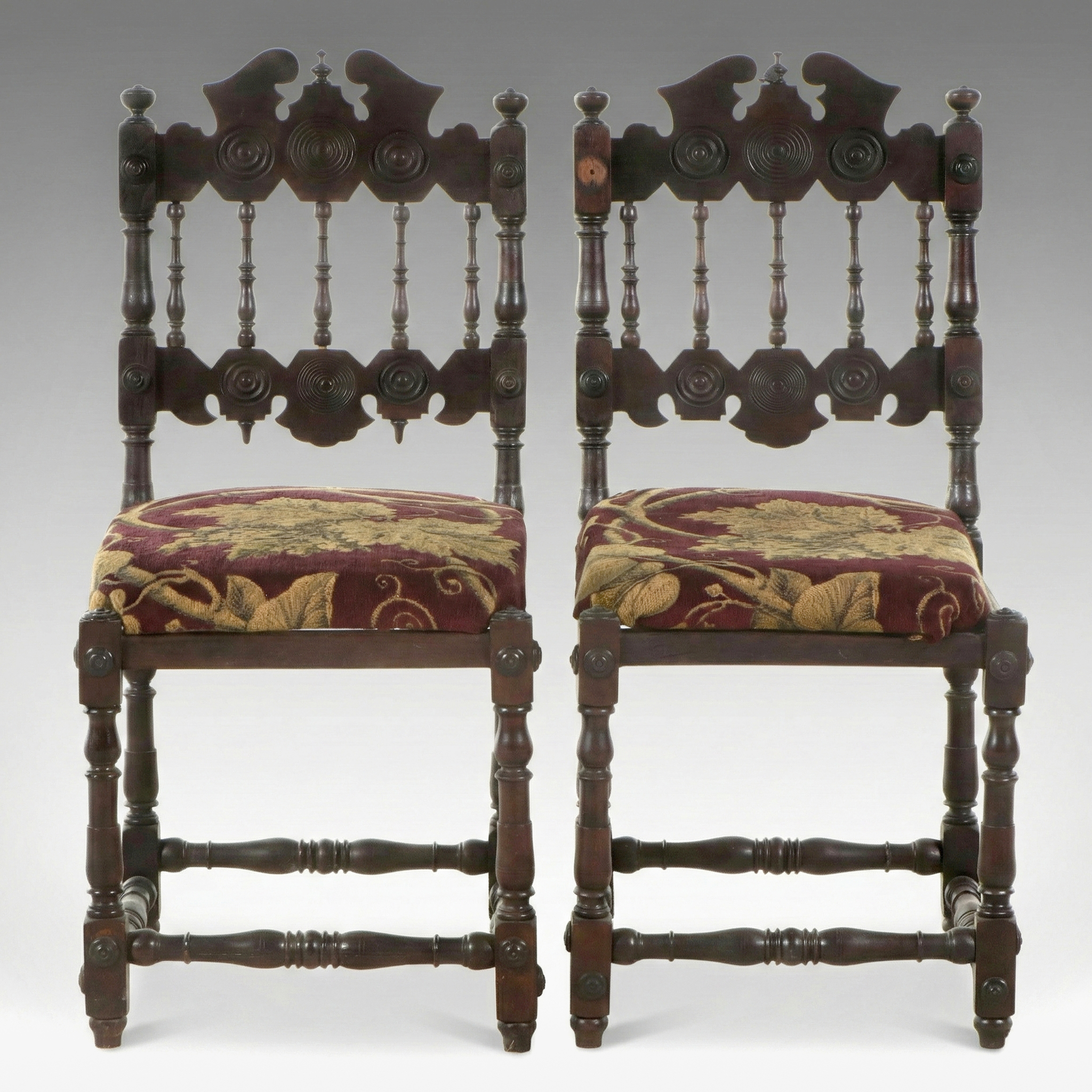Pair of Spanish Colonial Revival Carved Oak Hall Chairs