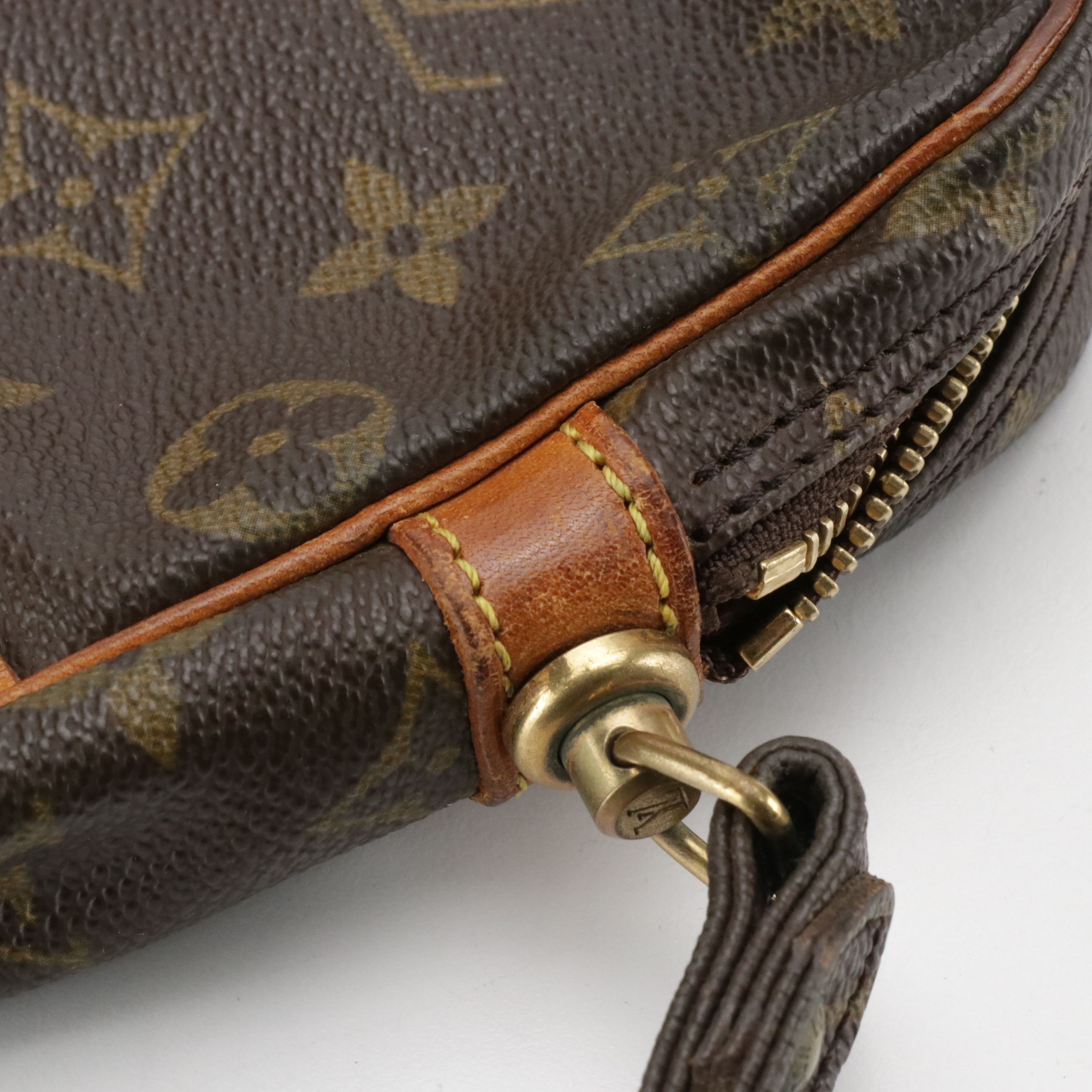 Louis Vuitton Marly Dragonne GM Wristlet in Monogram Canvas and Vachetta Leather