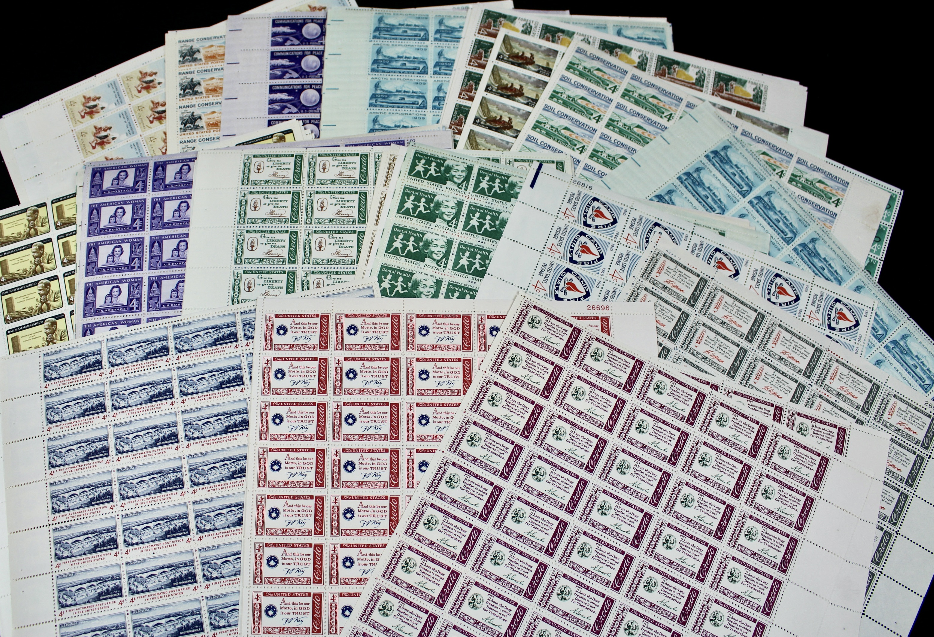 100 U.S. 4-Cent Postage Stamp Sheets, 1950s to 1960s