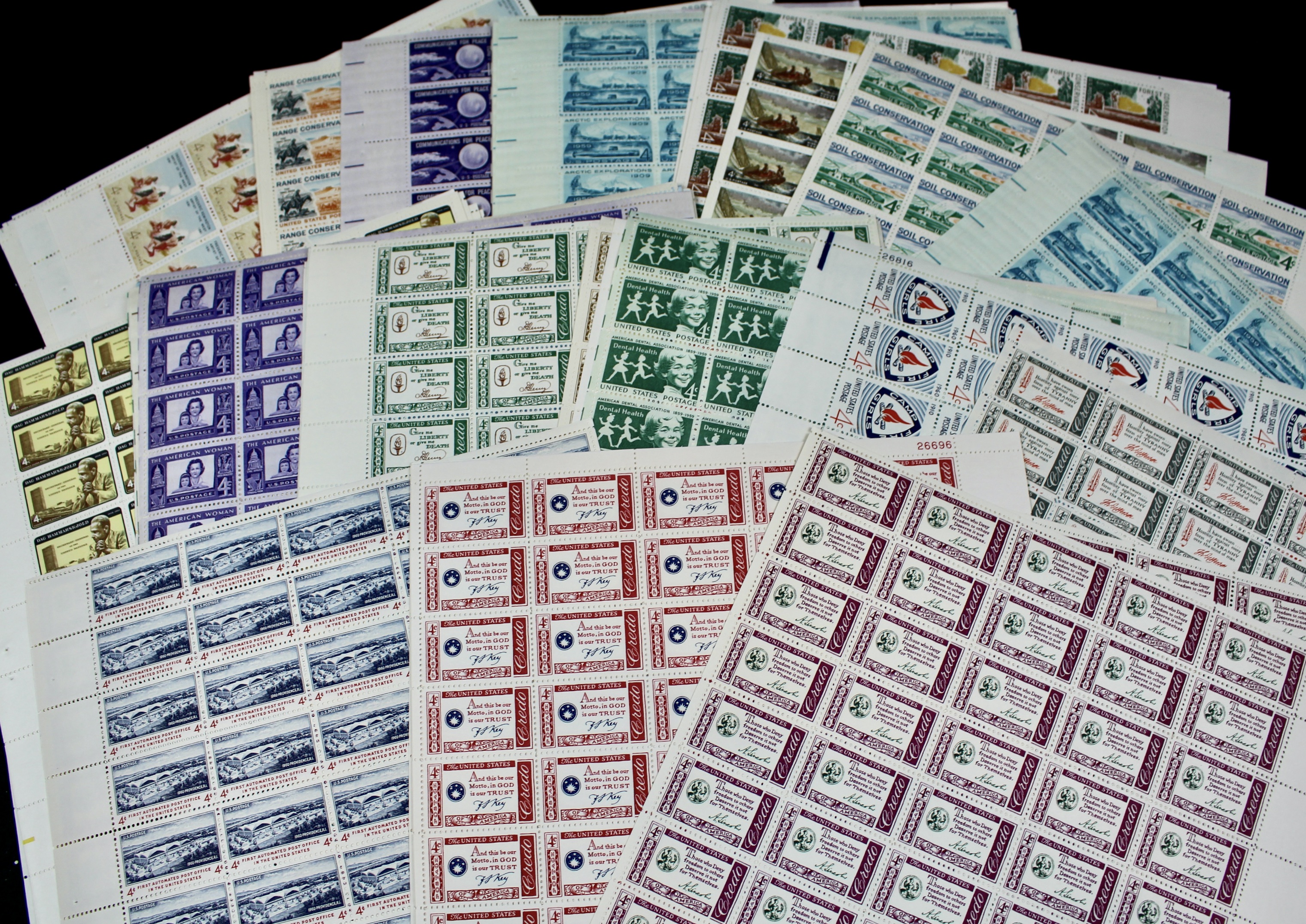 100 U.S. 4-Cent Postage Stamp Sheets, 1950s to 1960s
