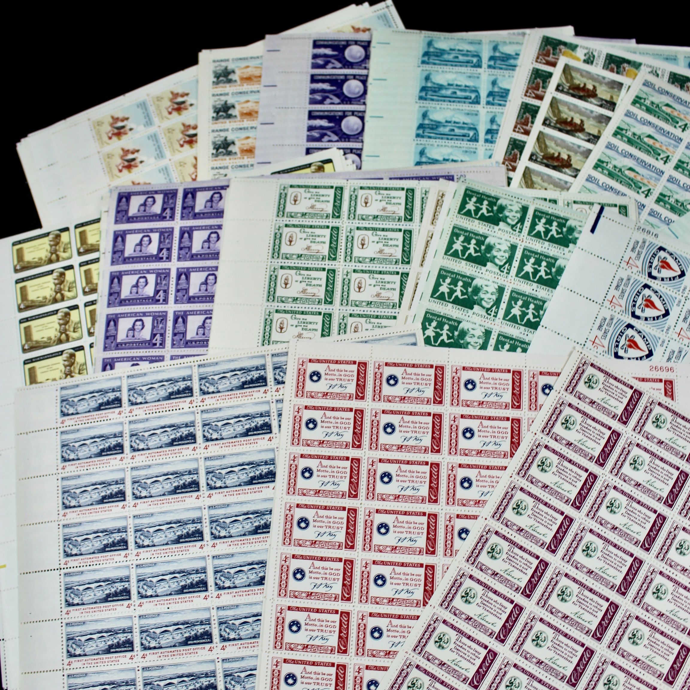 100 U.S. 4-Cent Postage Stamp Sheets, 1950s to 1960s