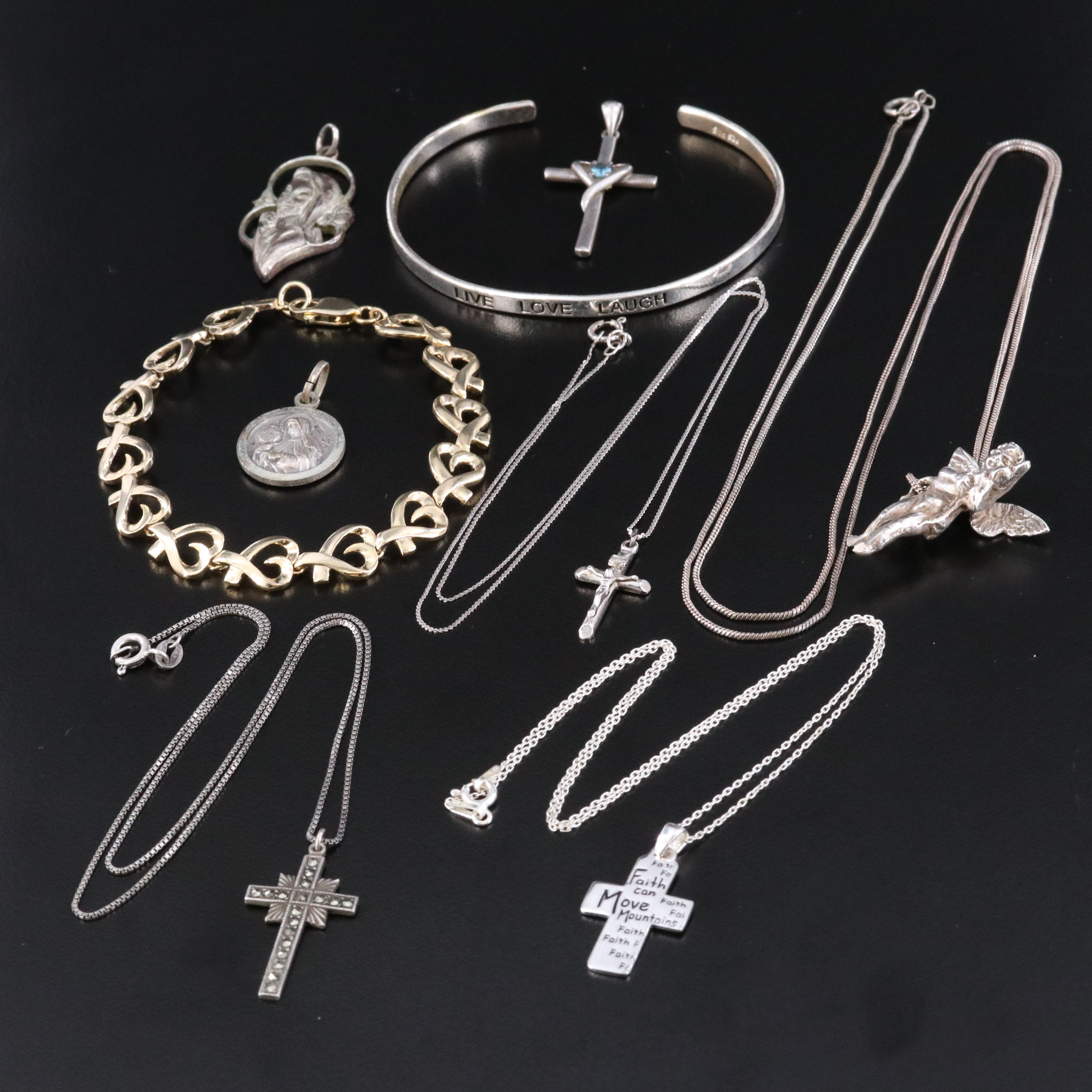 Sterling Religious Iconography Jewelry Featuring Blue Topaz and Marcasite