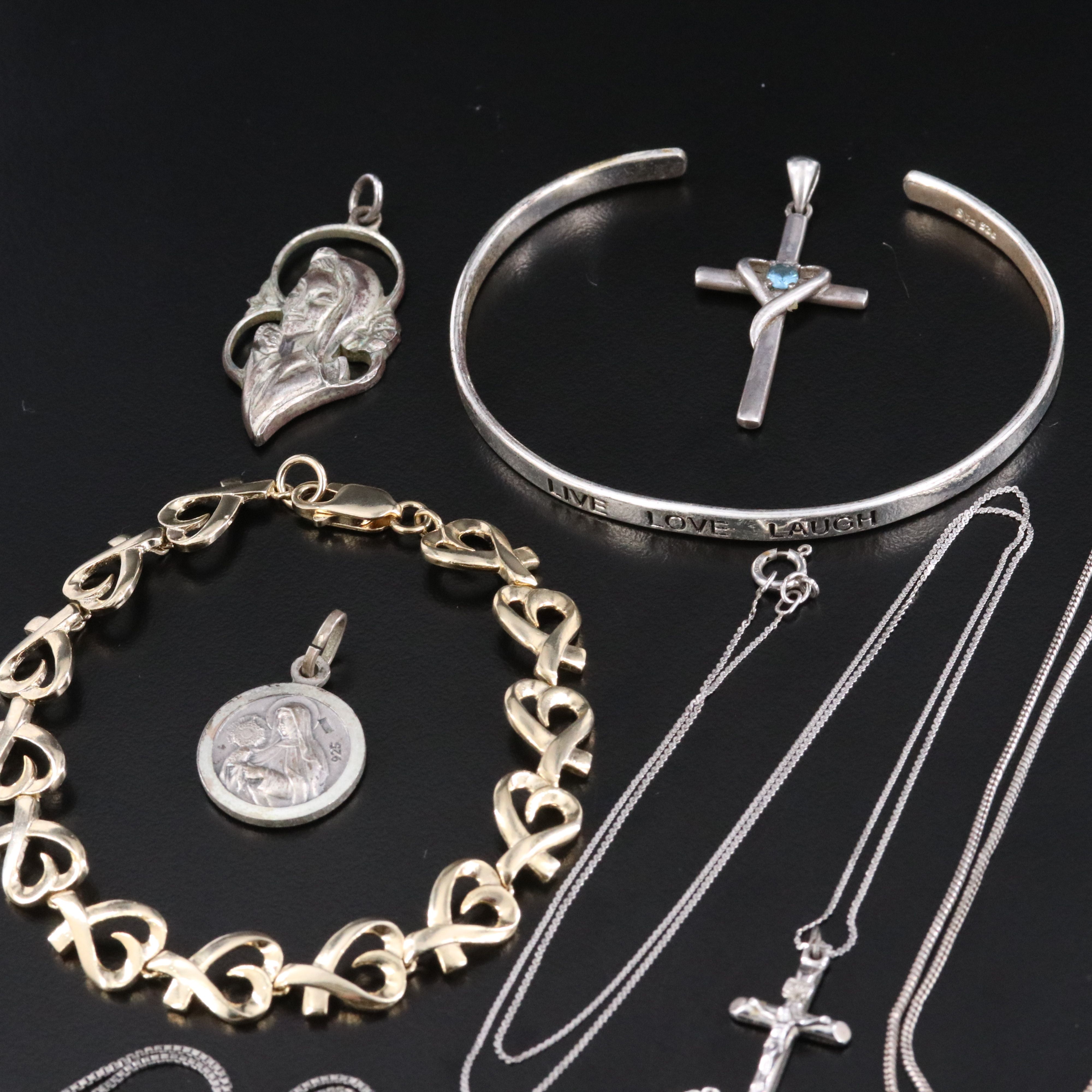 Sterling Religious Iconography Jewelry Featuring Blue Topaz and Marcasite