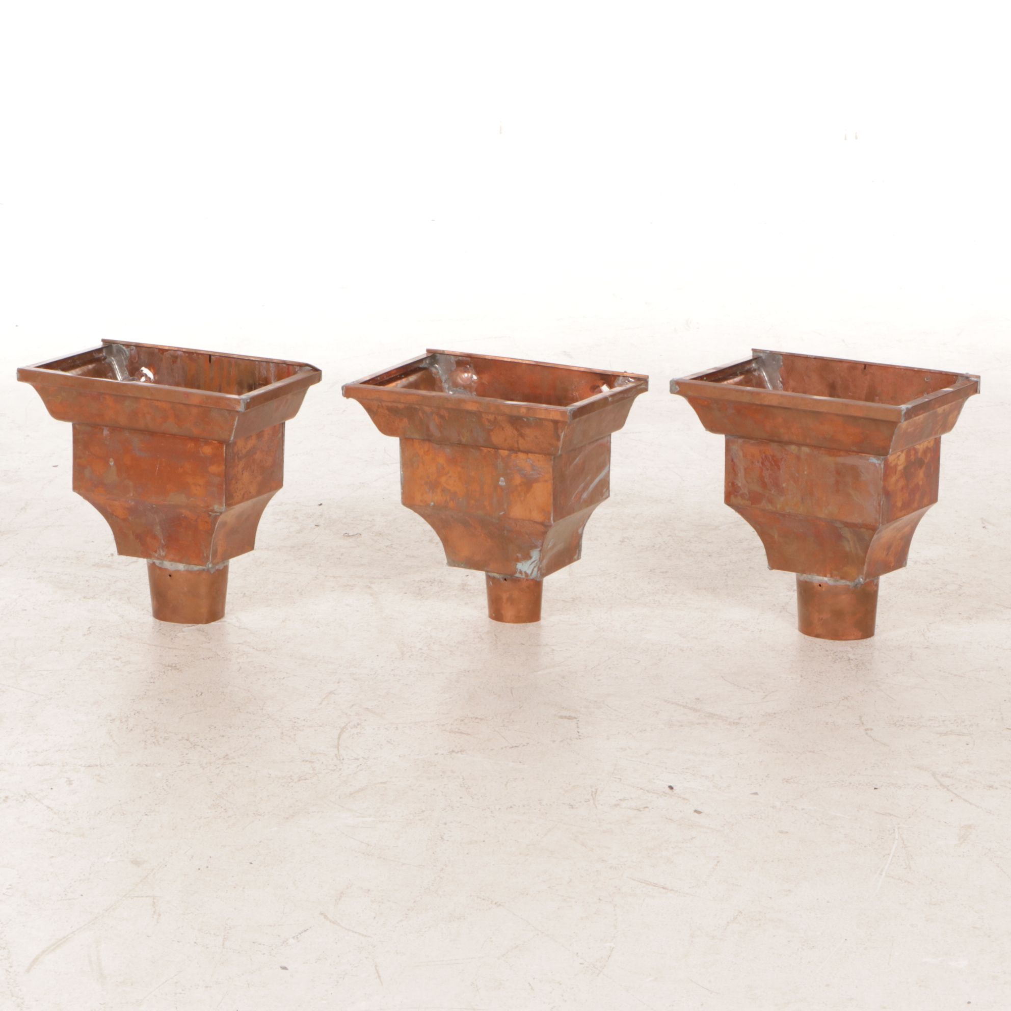 Three Copper Gutter Leader Heads