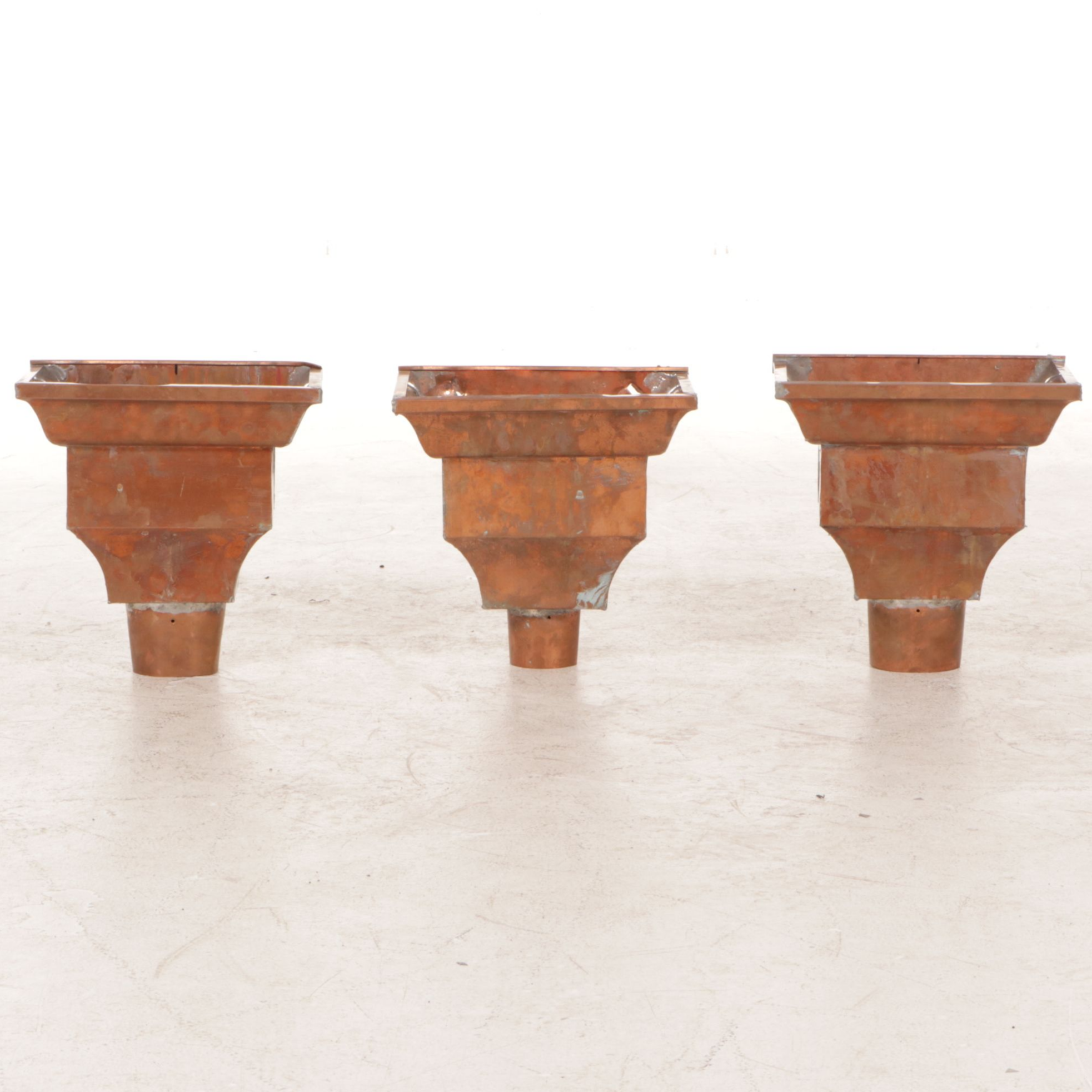 Three Copper Gutter Leader Heads