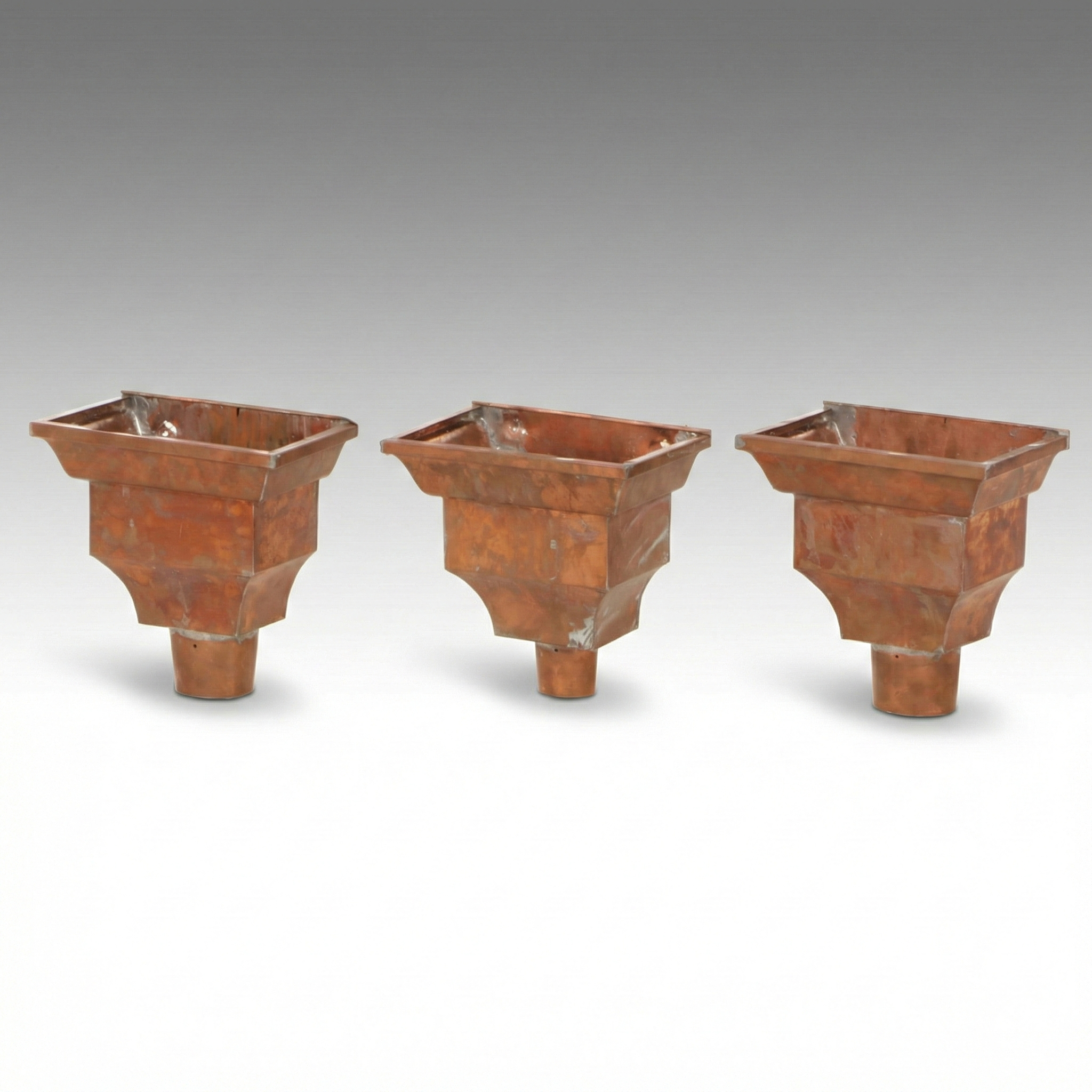 Three Copper Gutter Leader Heads